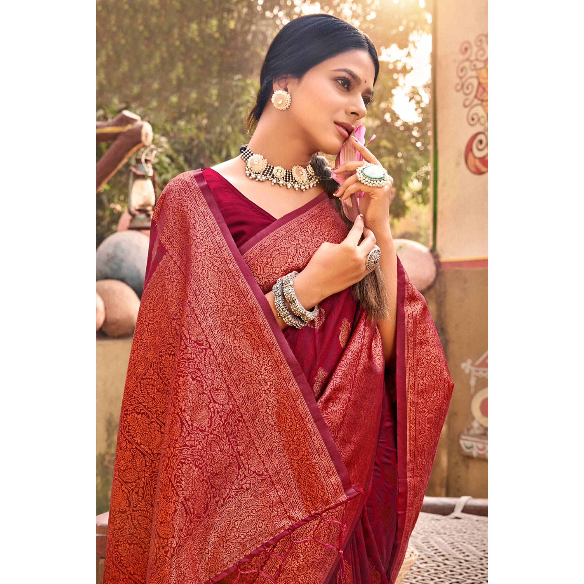 Maroon Floral Woven Banarasi Silk Saree With Tassels