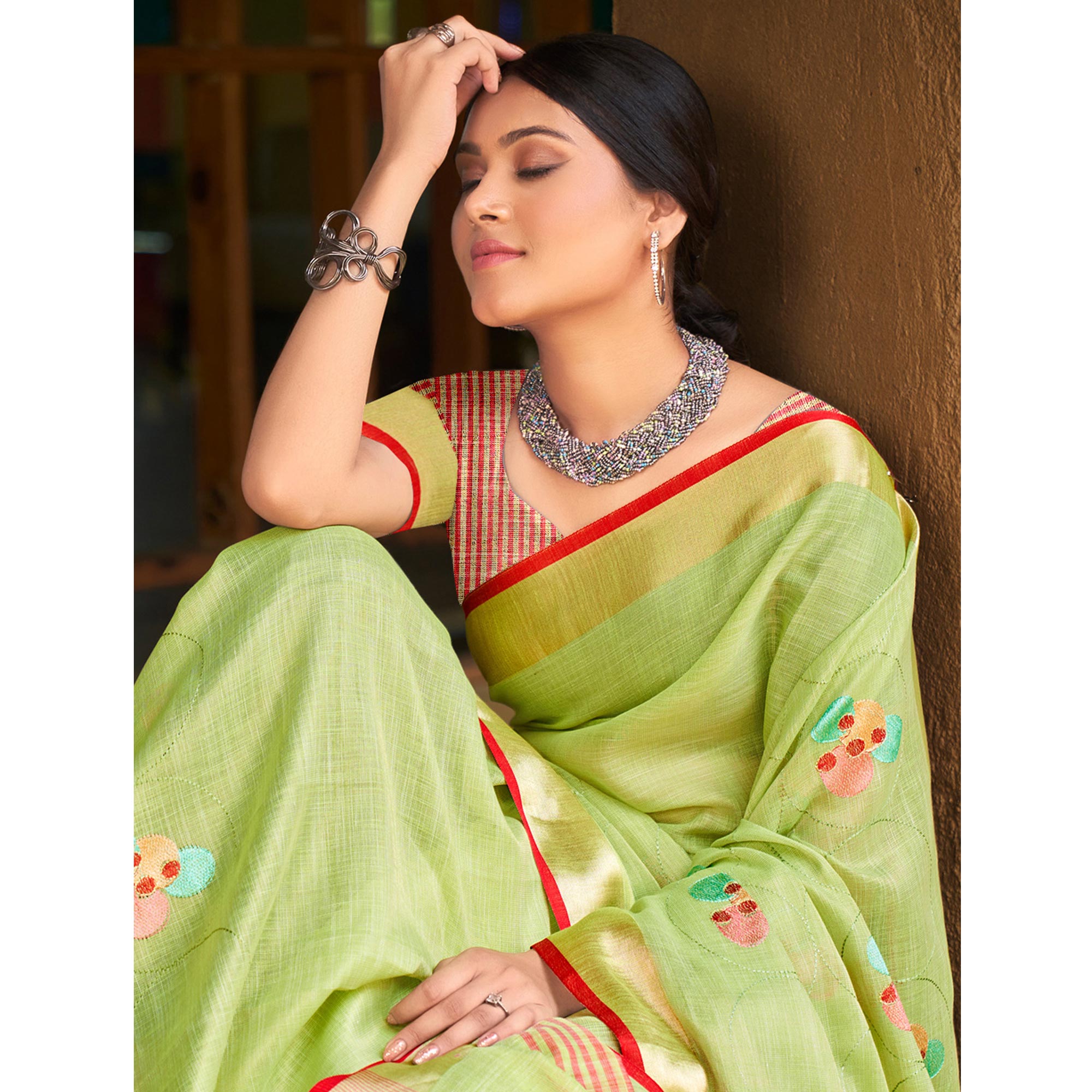 Green Floral Embroidered Linen Saree With Tassels
