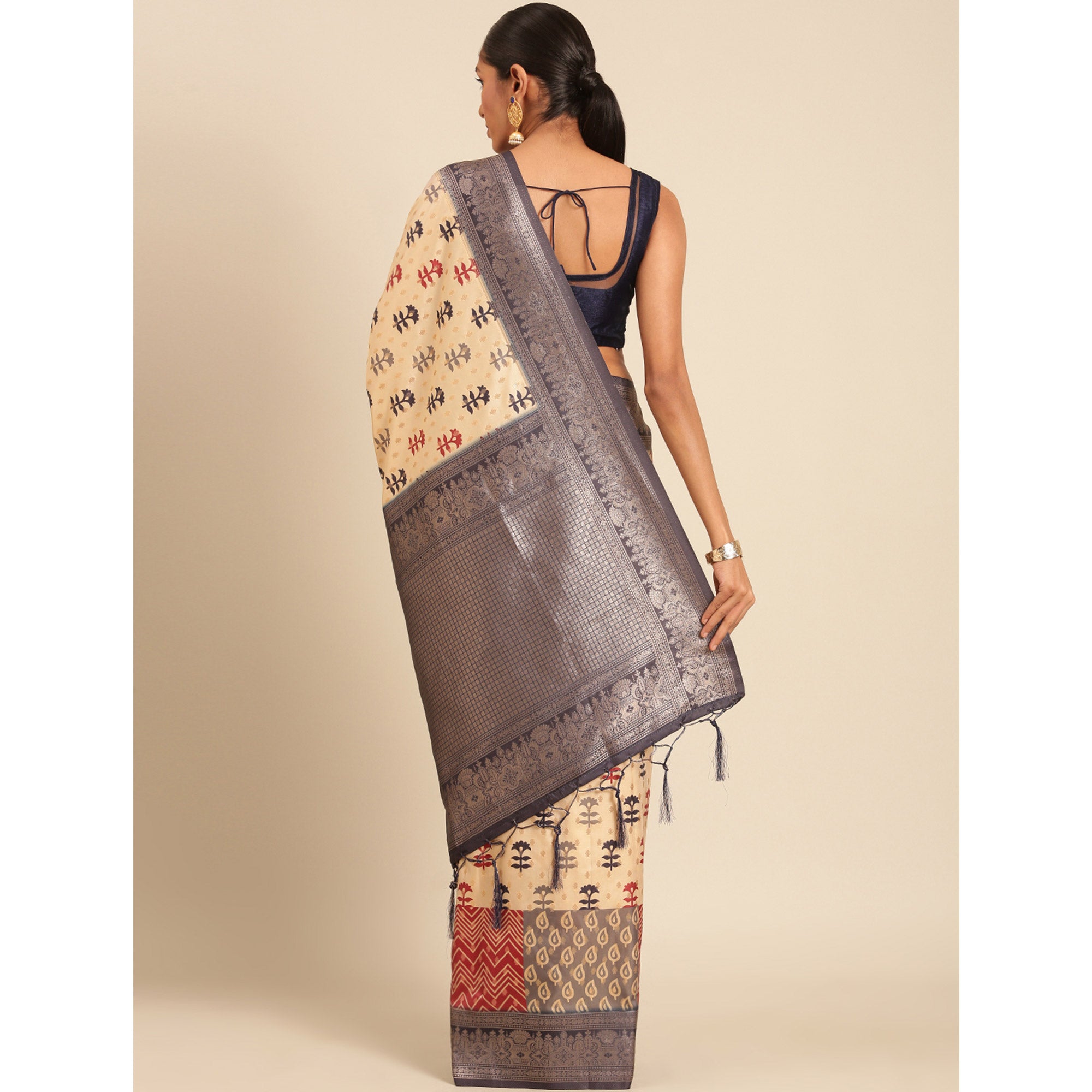 Cream Woven Banarasi Silk Saree With Tassels