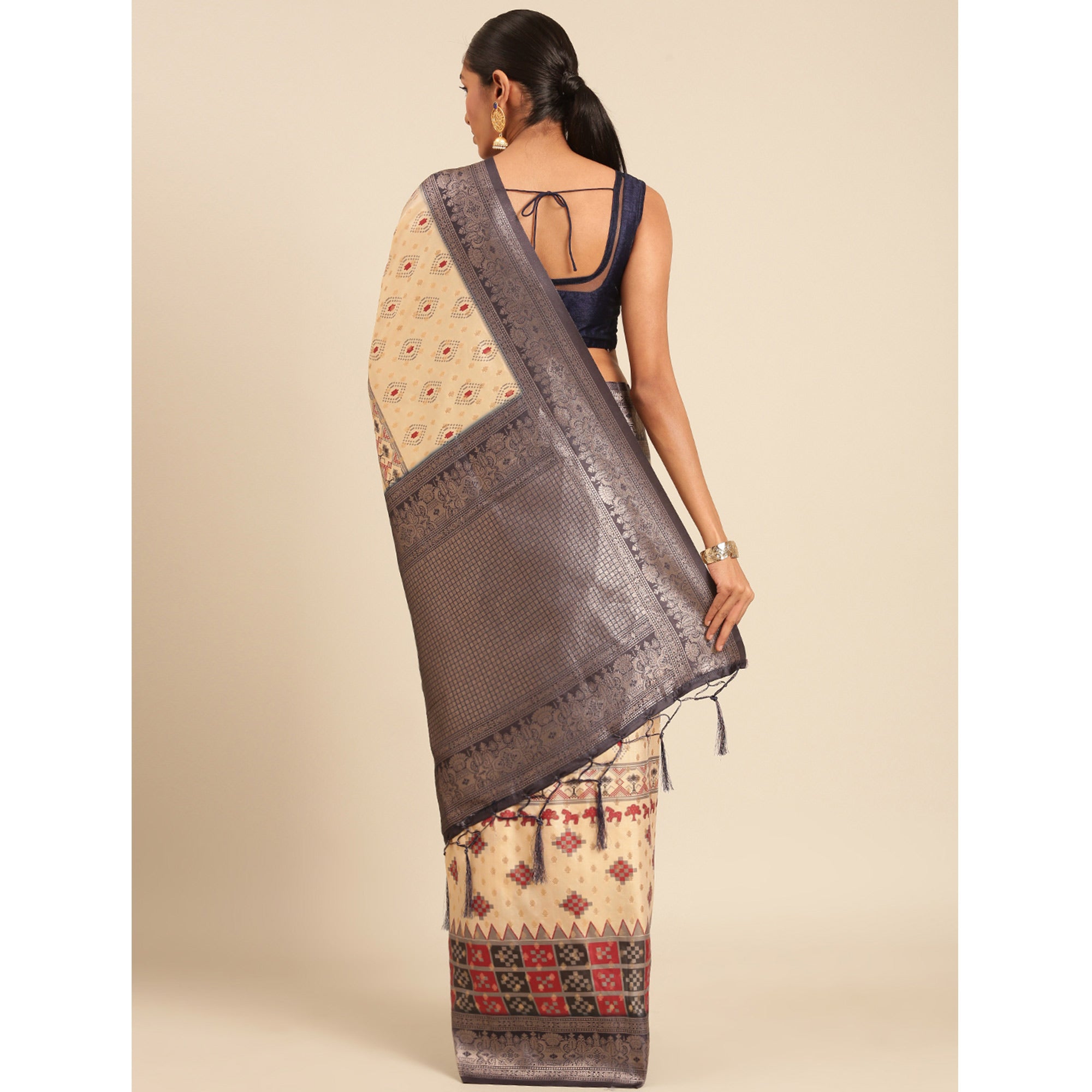 Cream Woven Banarasi Silk Saree With Tassels