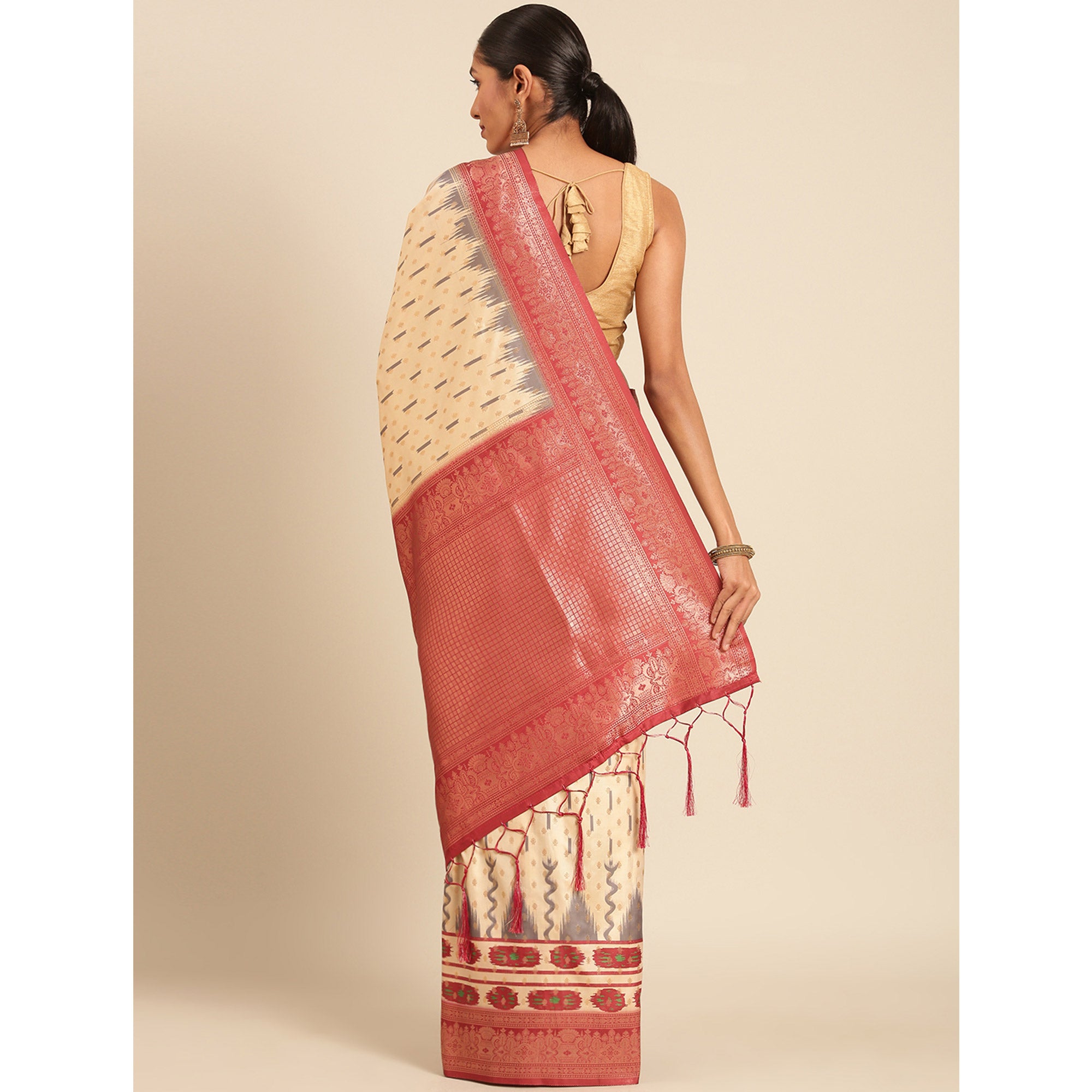 Cream Woven Banarasi Silk Saree With Tassels