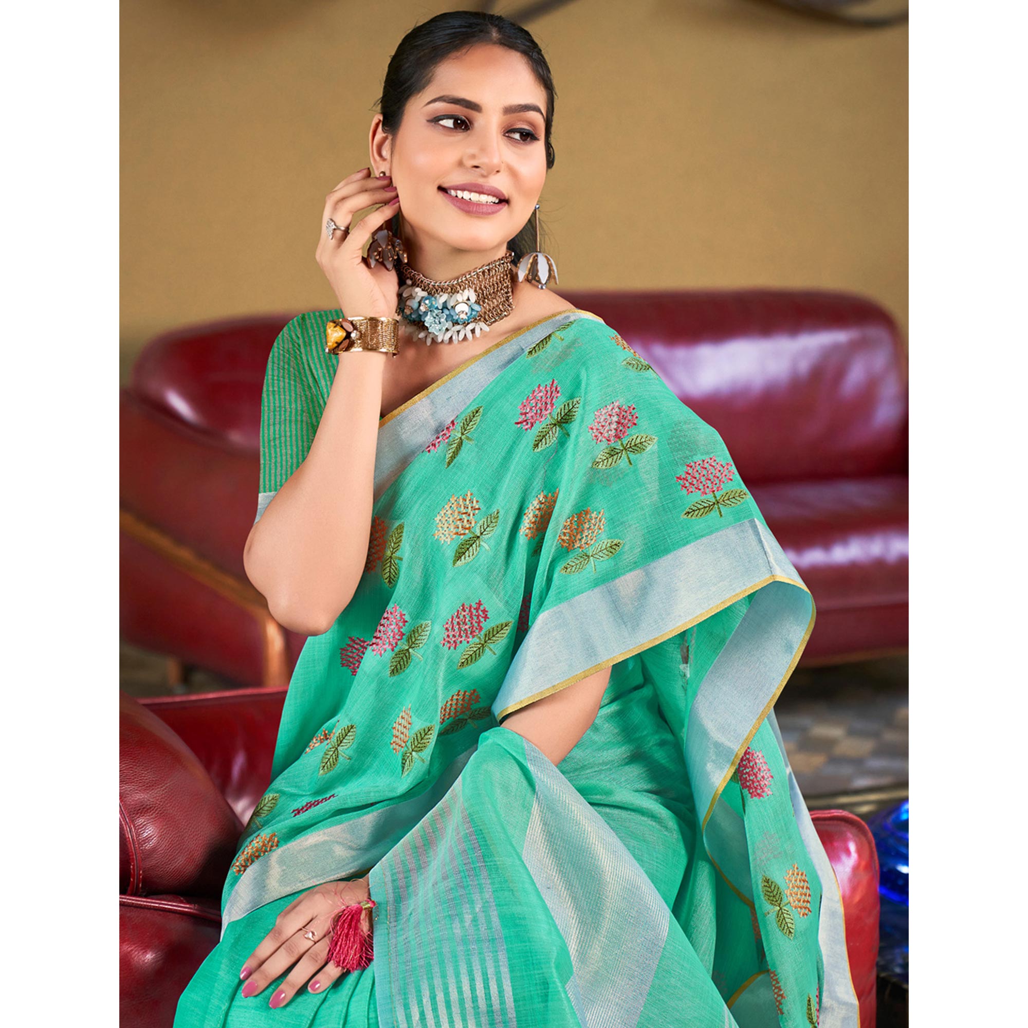 Sea Green Floral Embroidered Linen Saree With Tassels