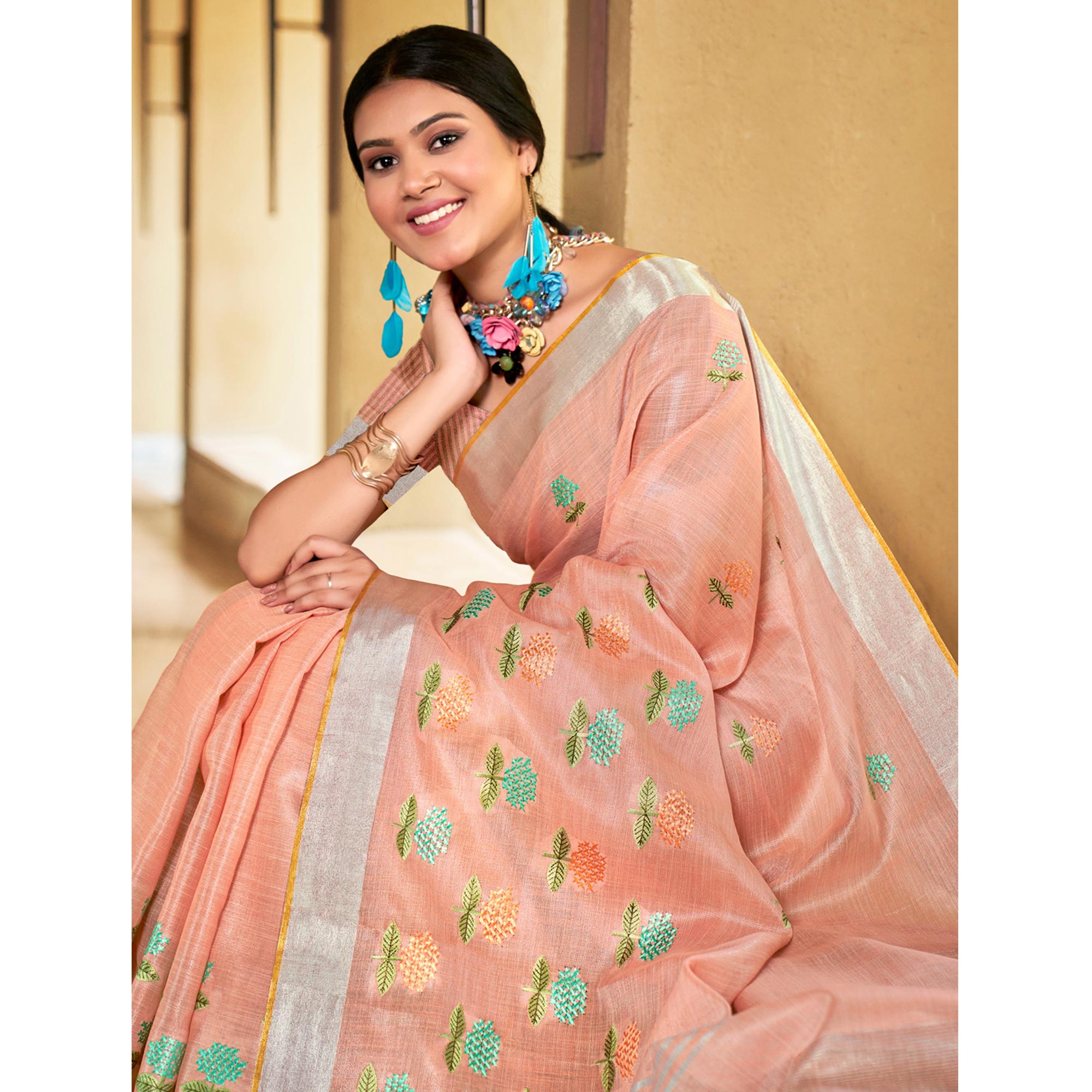 Peach Floral Embroidered Linen Saree With Tassels