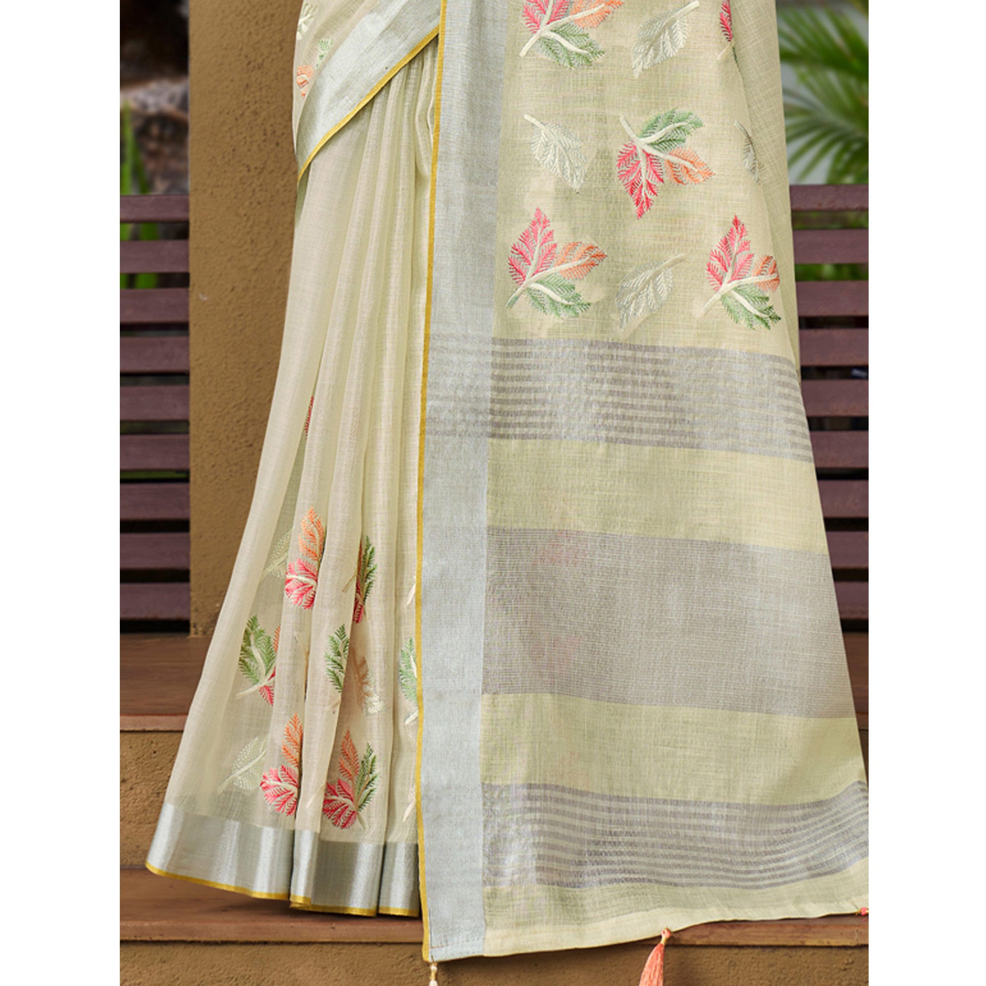 Pale Yellow Floral Embroidered Linen Saree With Tassels