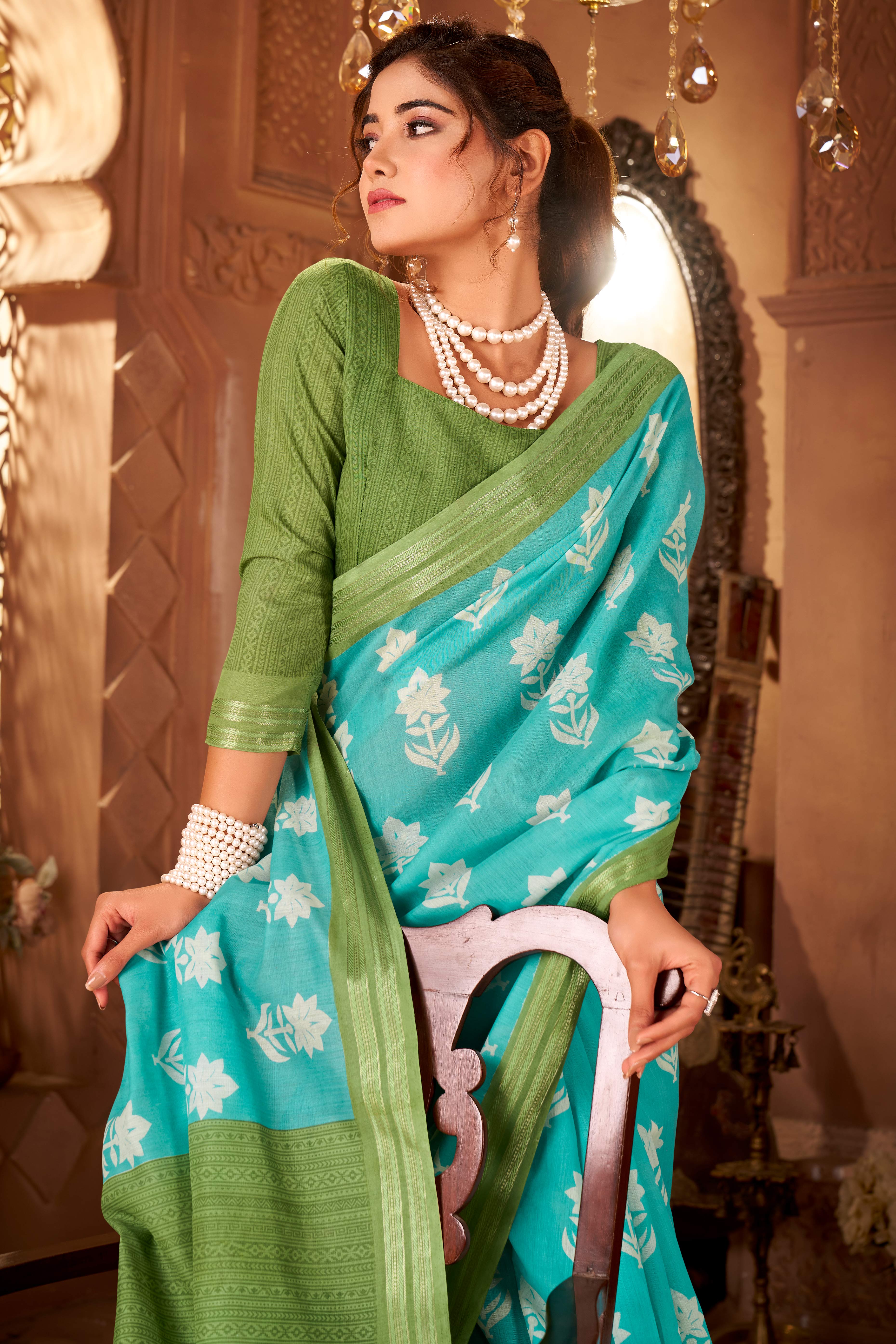 Sophisticated Blue Mulmul Cotton Saree Featuring Delicate Floral Prints & Weaving Border