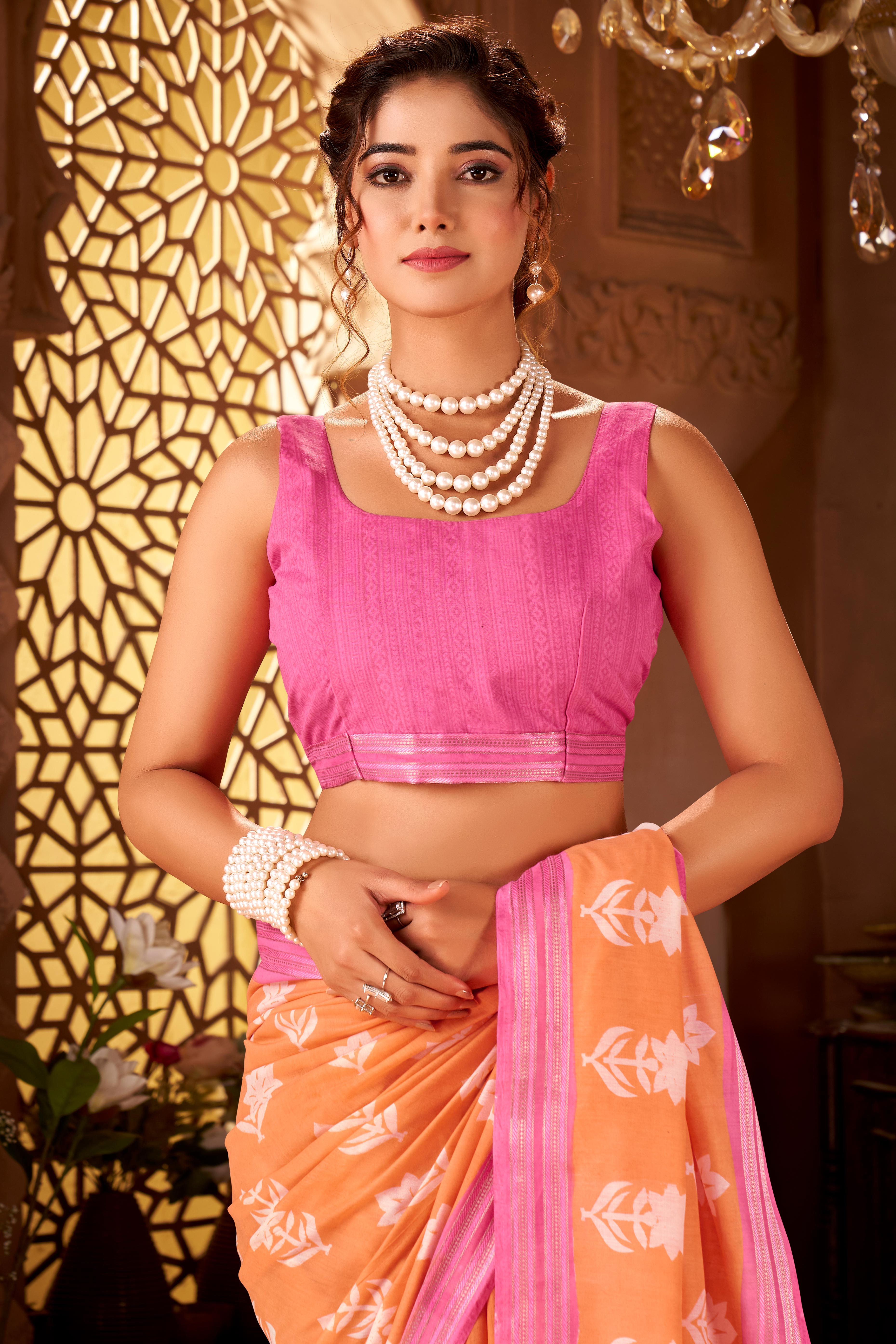 Sophisticated Peach Mulmul Cotton Saree Featuring Delicate Floral Prints & Weaving Border