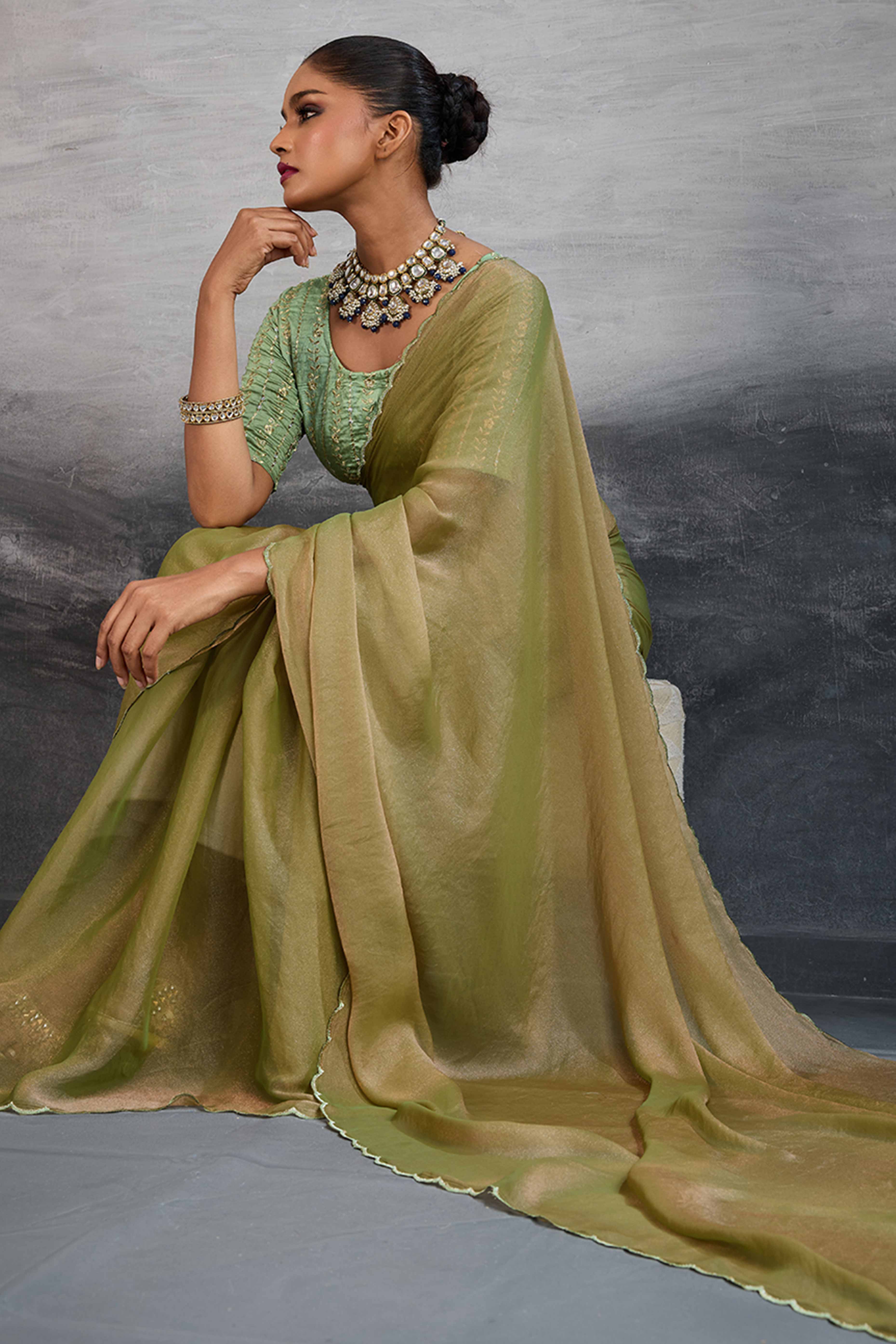 Light Olive Green Solid Organza Jimmy Choo Saree Accentuated With Elegant Cutwork Border Detailing