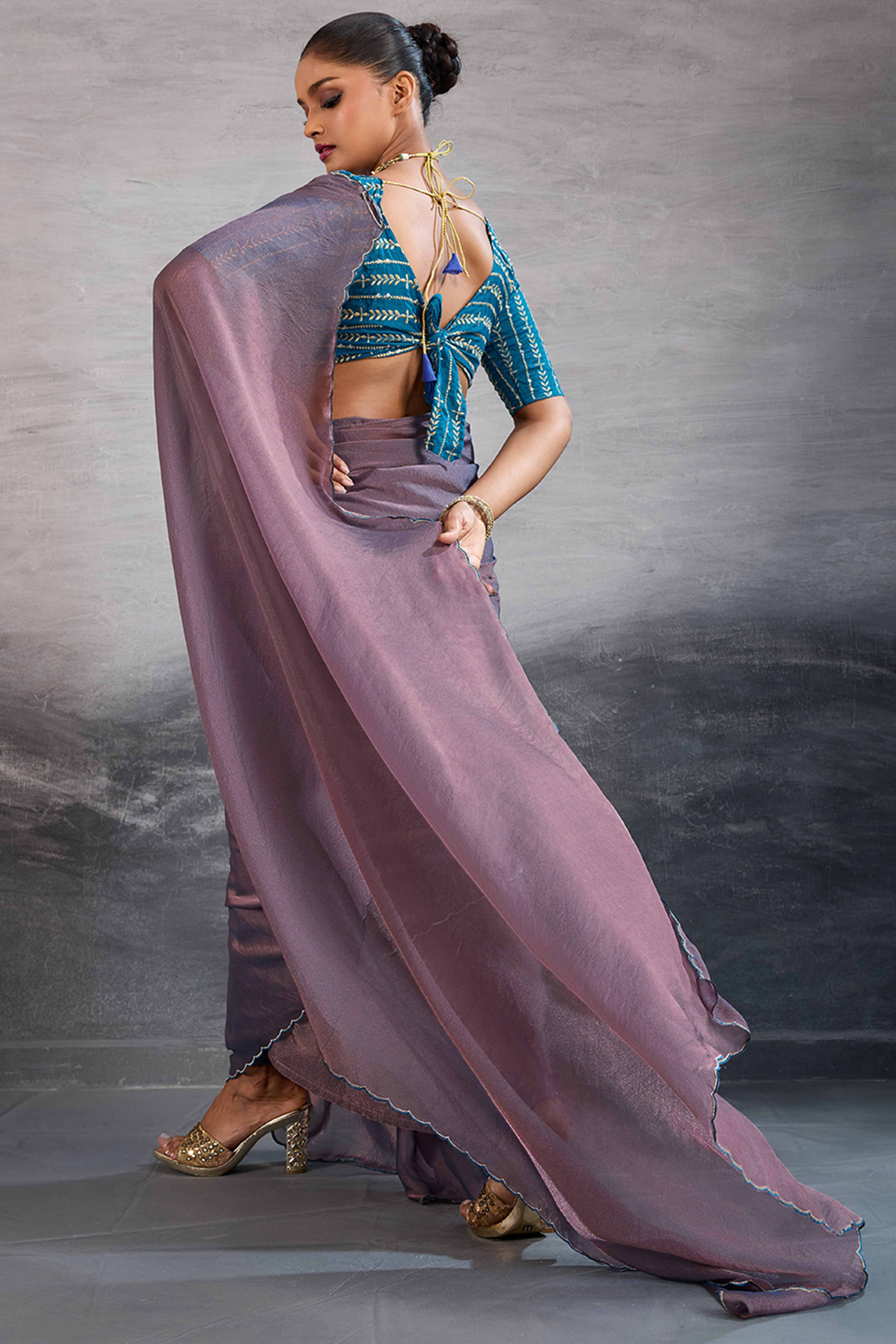 Mauve Solid Organza Jimmy Choo Saree Accentuated With Elegant Cutwork Border Detailing