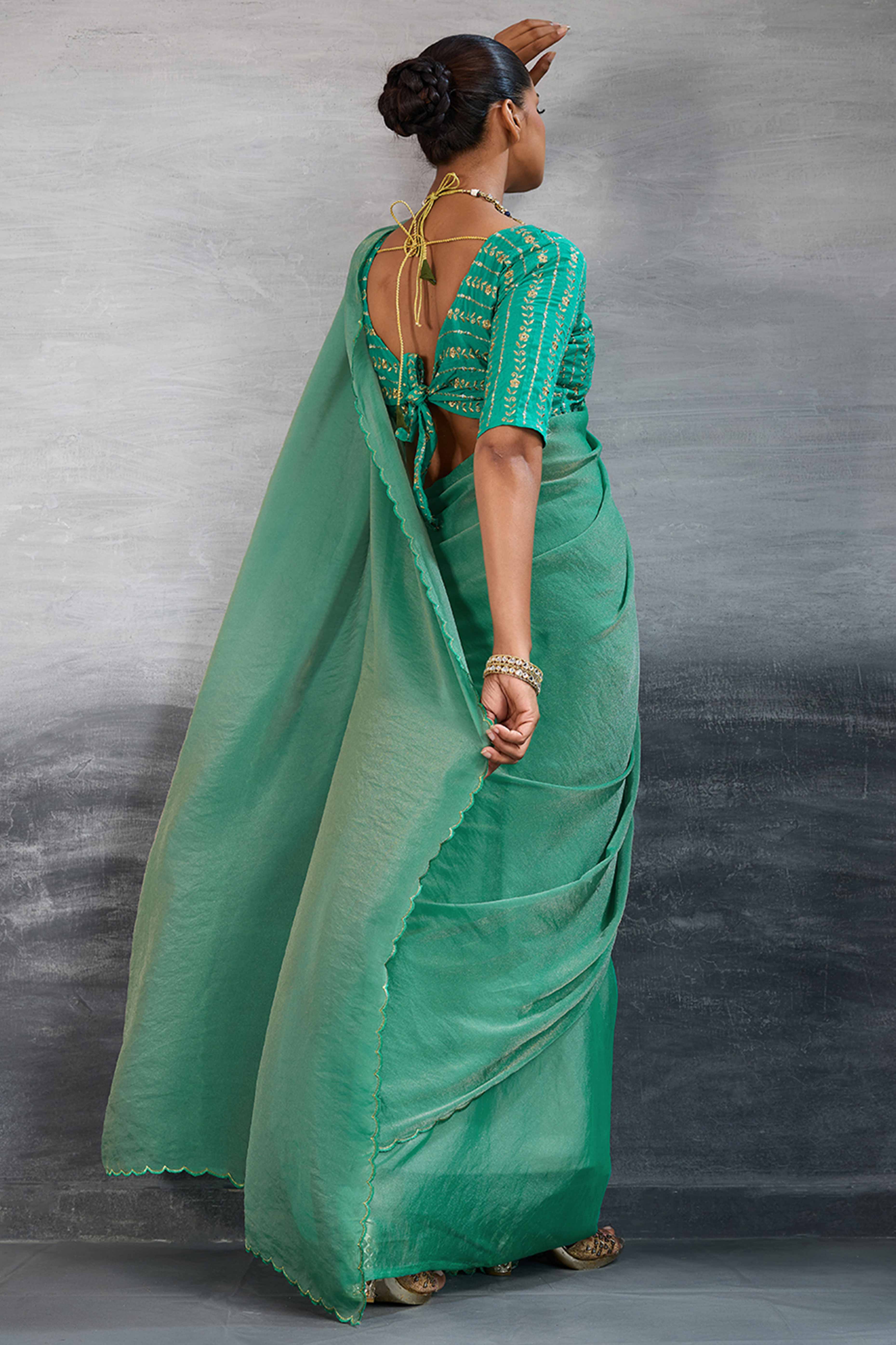 Green Solid Organza Jimmy Choo Saree Accentuated With Elegant Cutwork Border Detailing