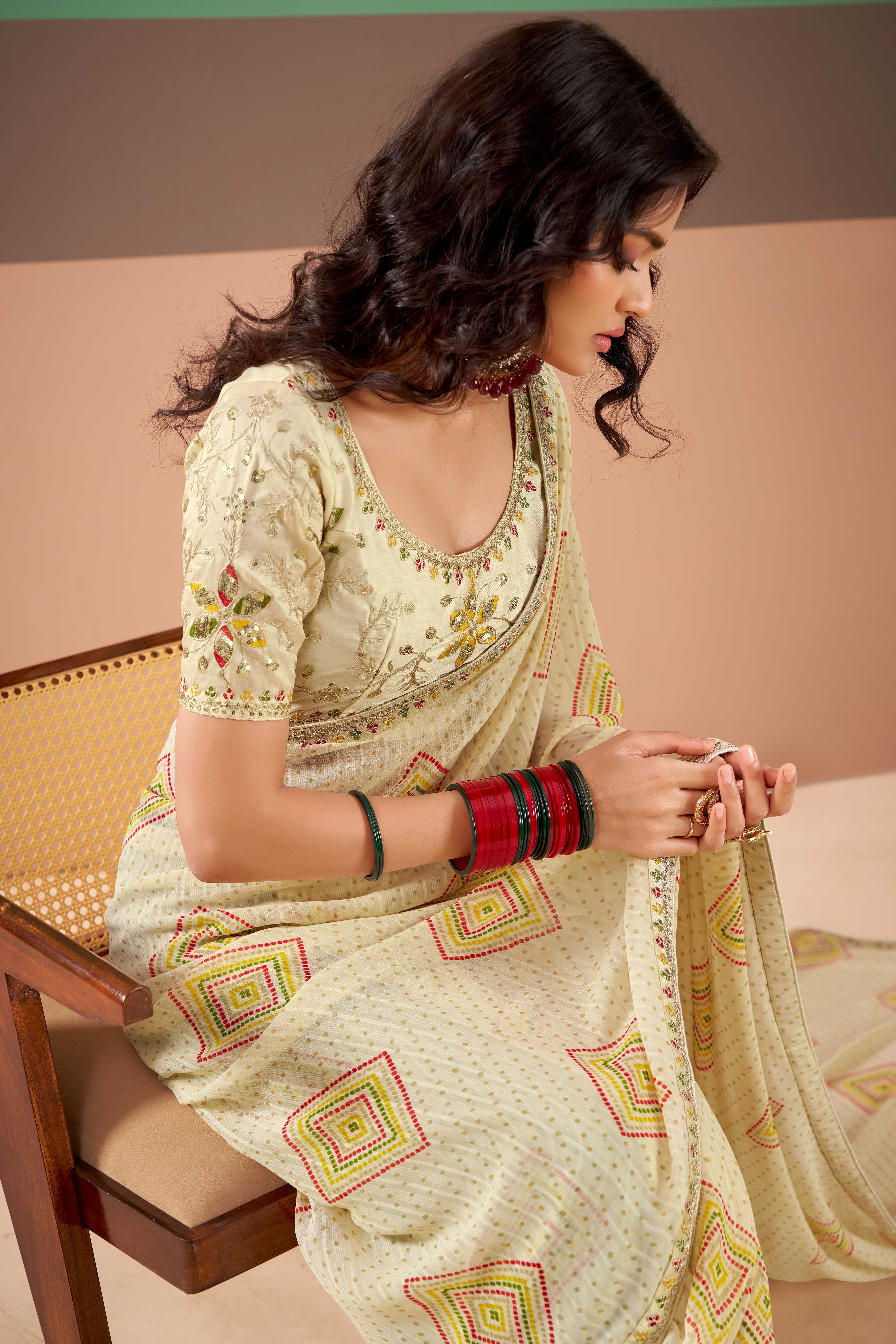 Charming Offwhite Bandhani Printed Georgette Saree Adorned With Cording Embroidered Border