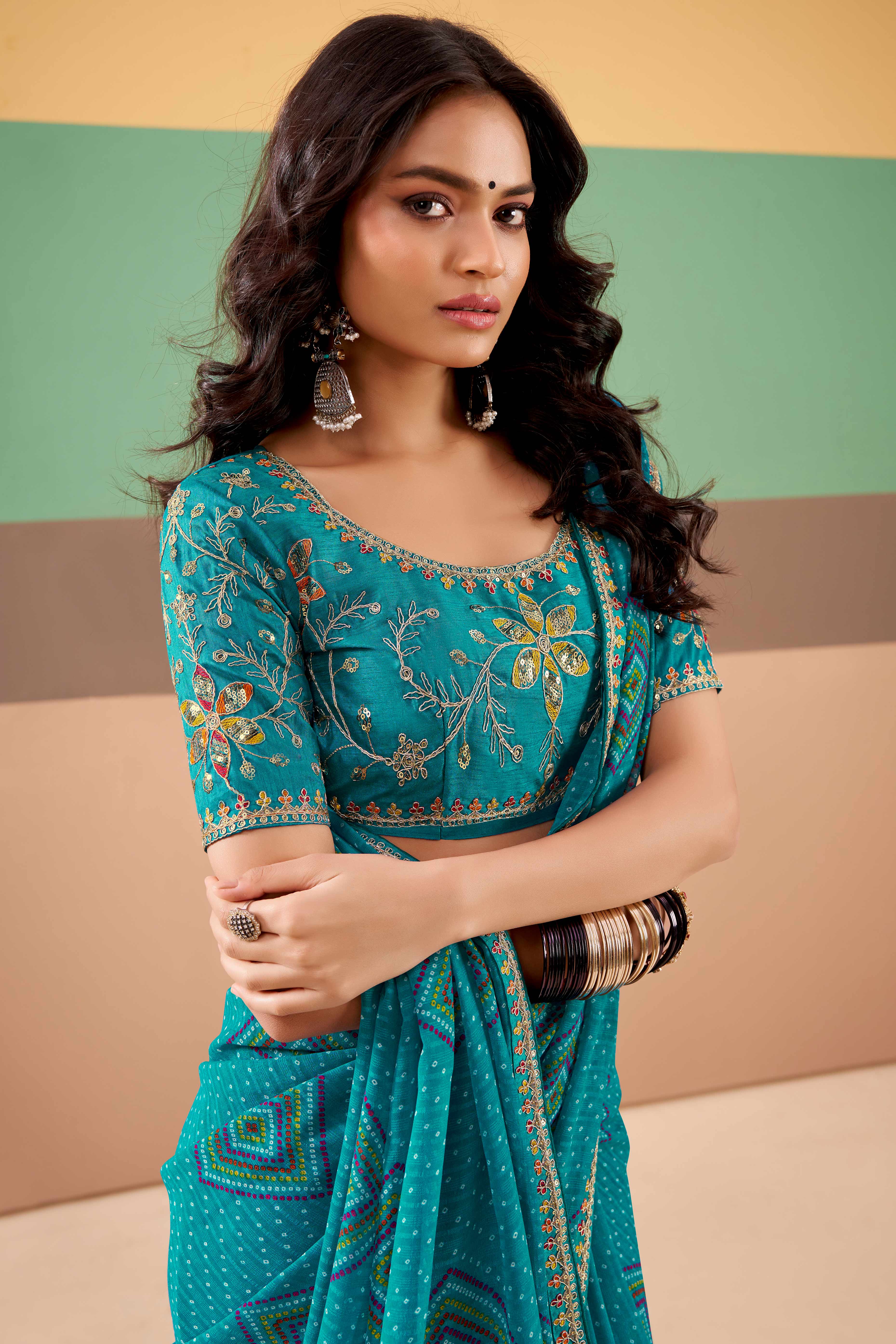 Charming Blue Bandhani Printed Georgette Saree Adorned With Intricate Cording Embroidered Border