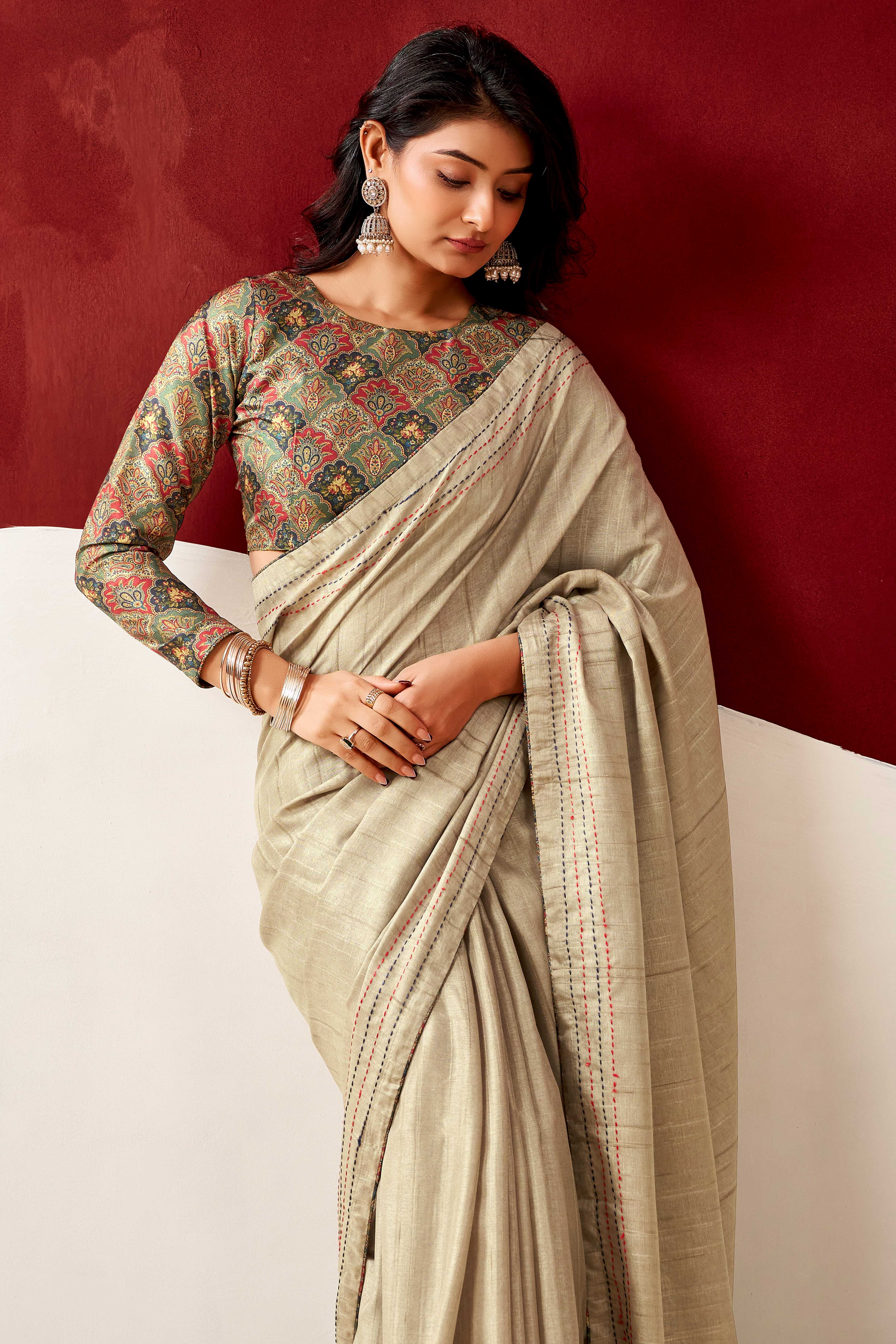 Graceful Cream Handloom Cotton Blend Saree Featuring Striped Lining Embroidery & Tassel Pallu