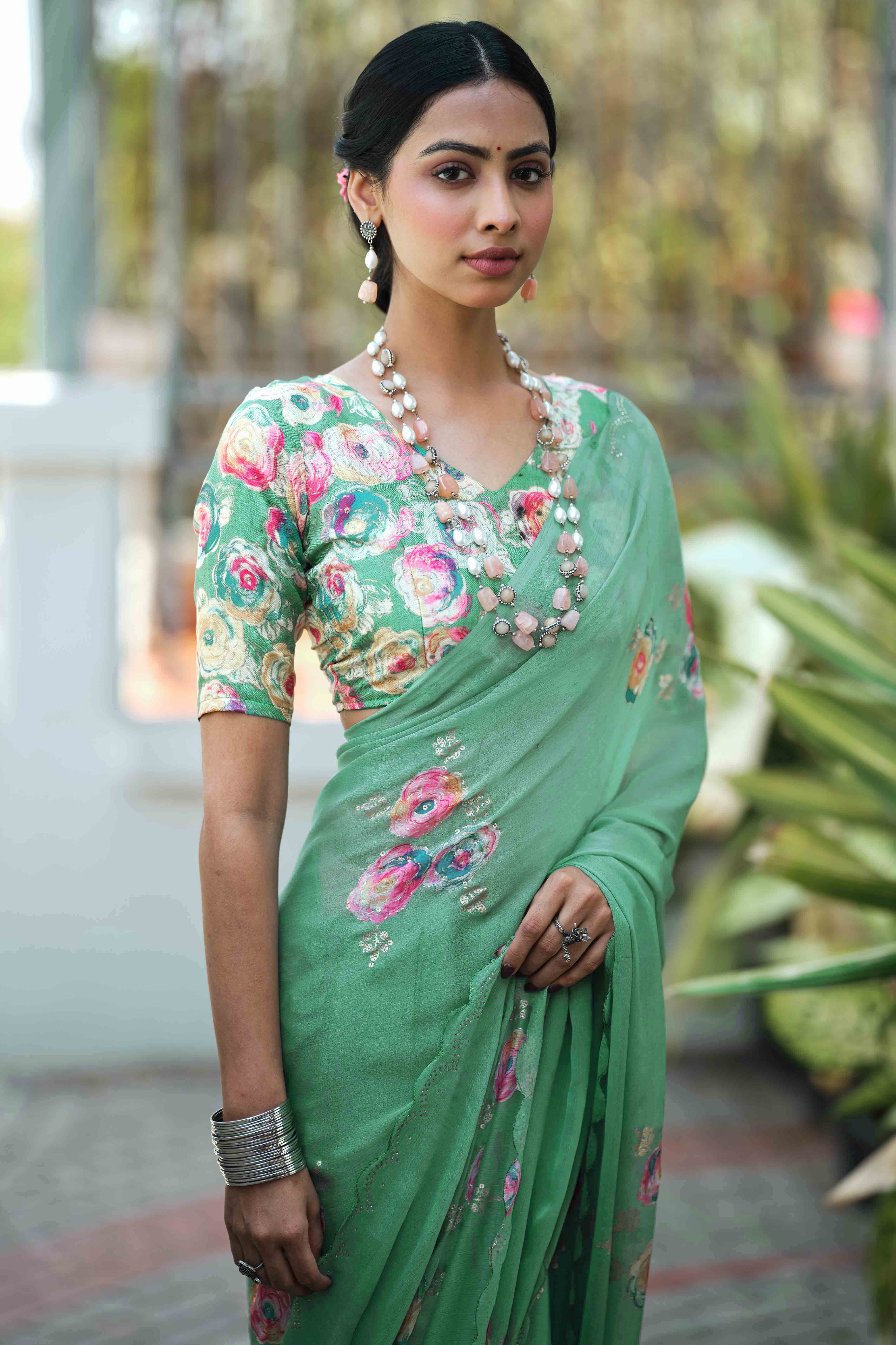 Elegant Sea Green Chiffon Saree with Floral and Foil Print Detailing