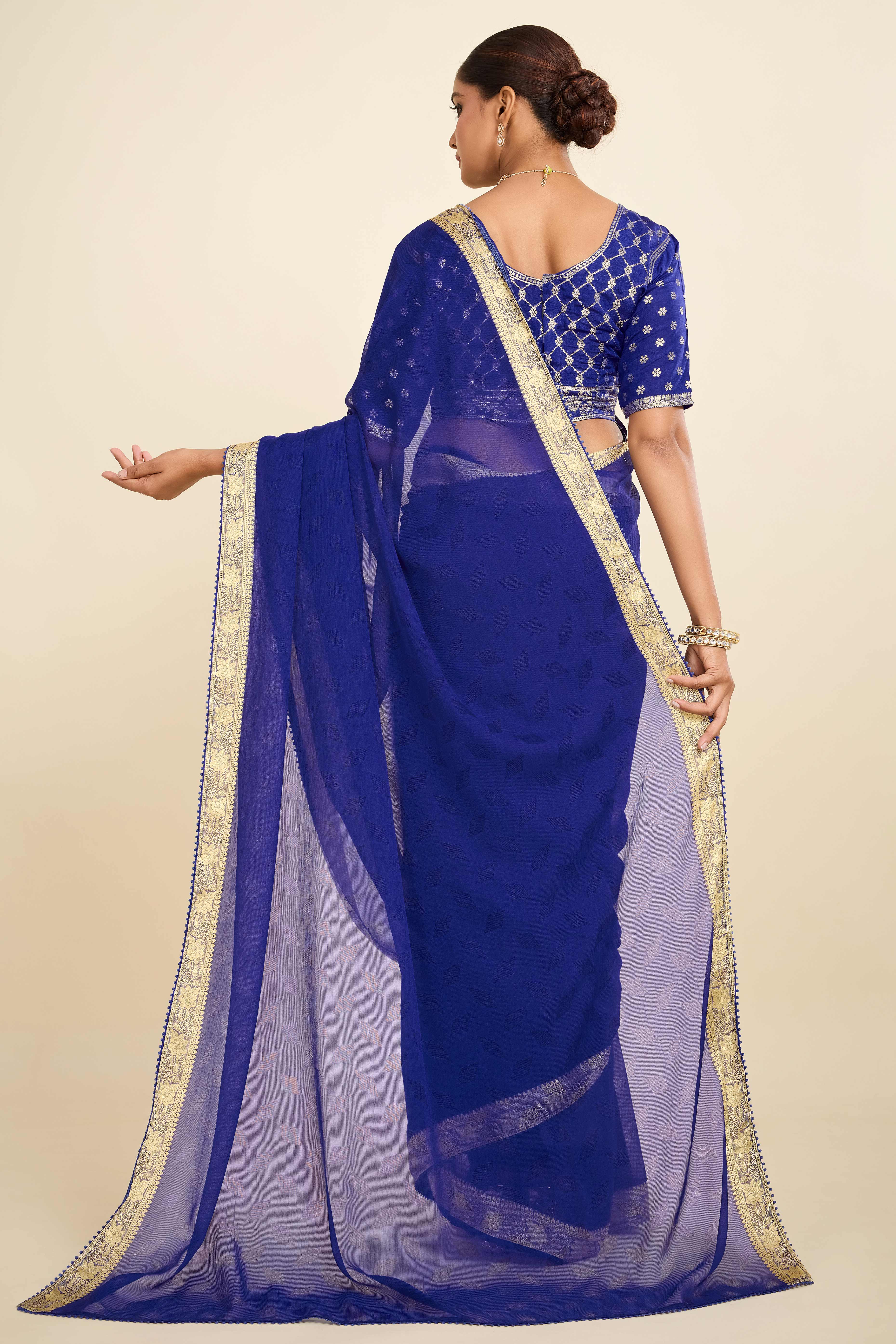 Blue Printed Chiffon Saree with Intricate Woven Edging