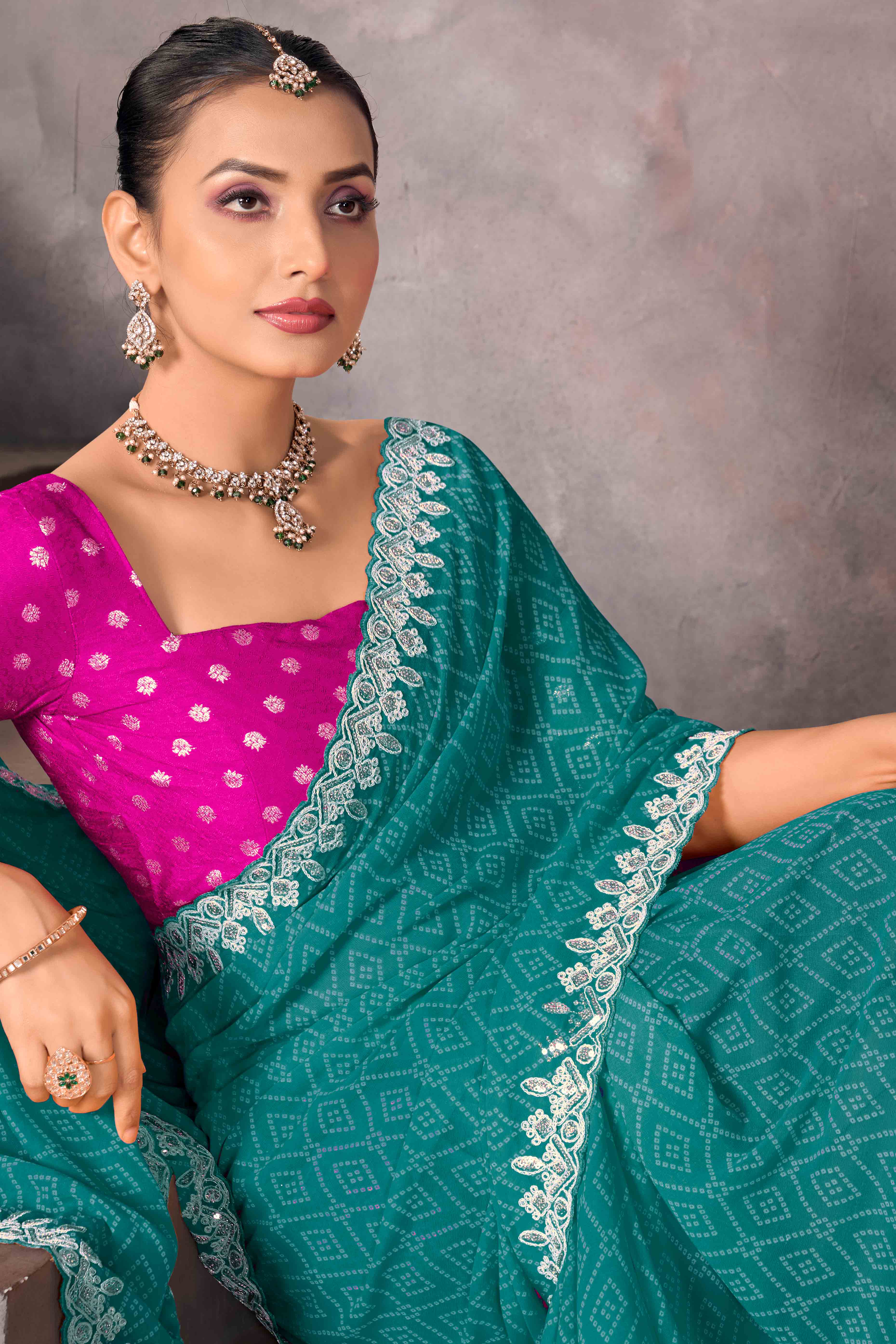 Modern Turquoise Georgette Saree with Timeless Bandhani Prints