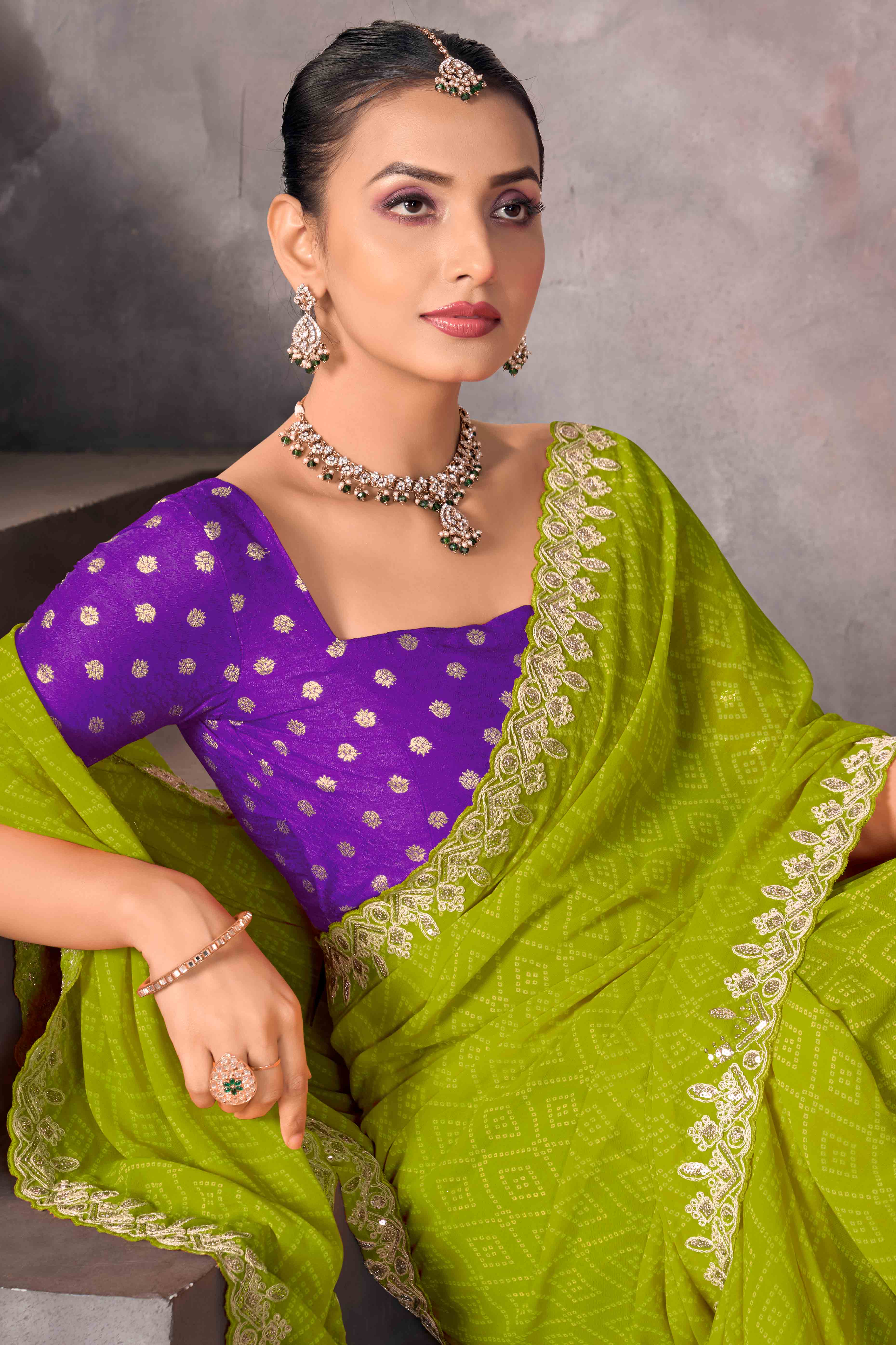 Modern Parrot Green Georgette Saree with Timeless Bandhani Prints
