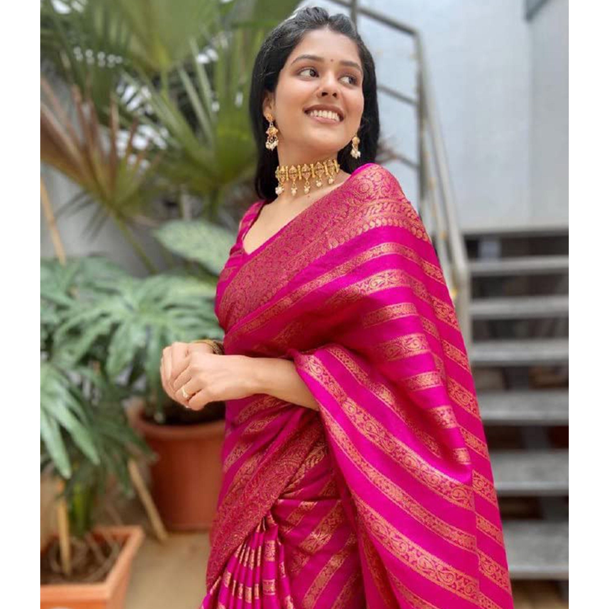 Pink Woven Banarasi Silk Saree with Tassels