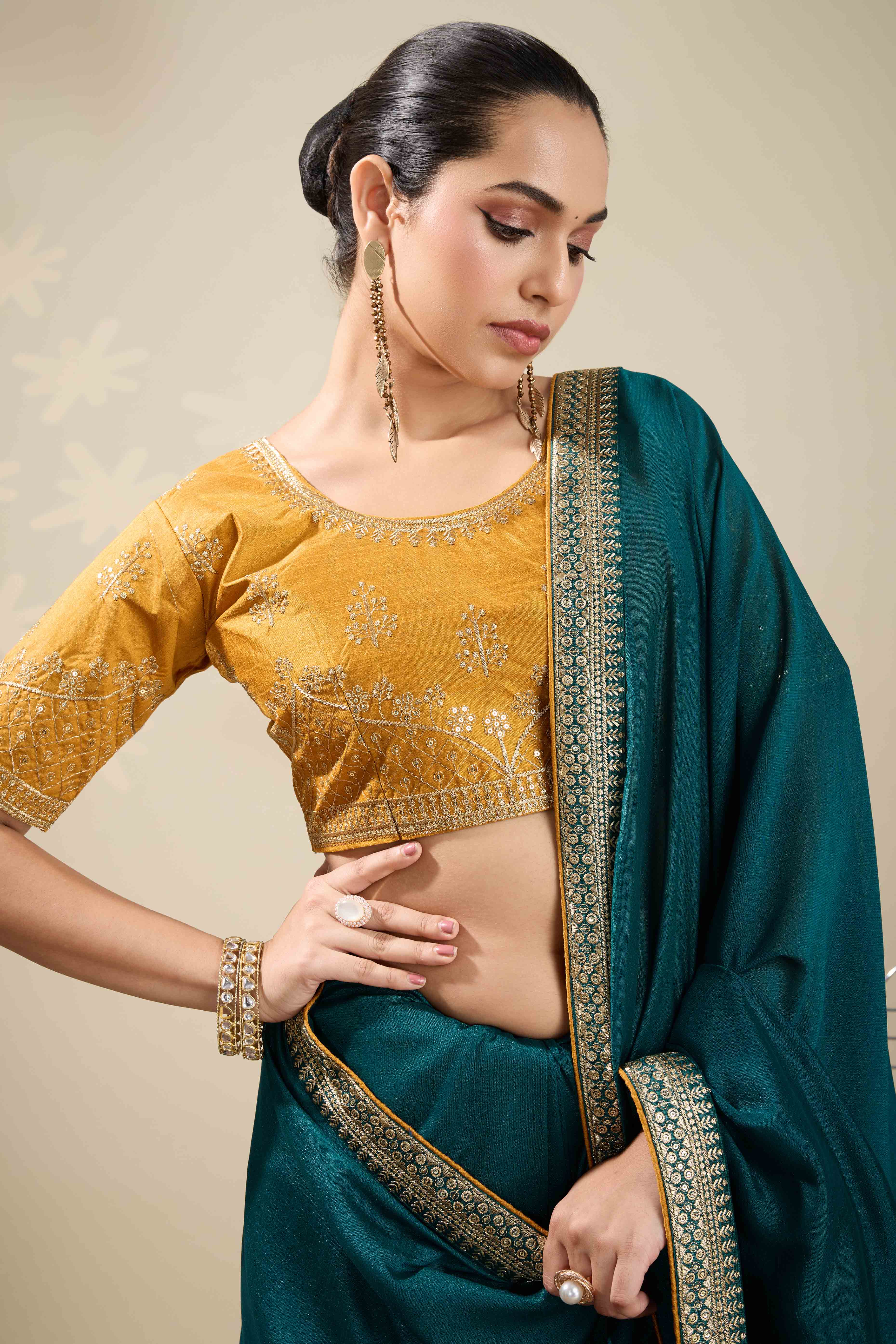 Graceful Vichitra Silk Saree in Teal with Embroidered Bordering