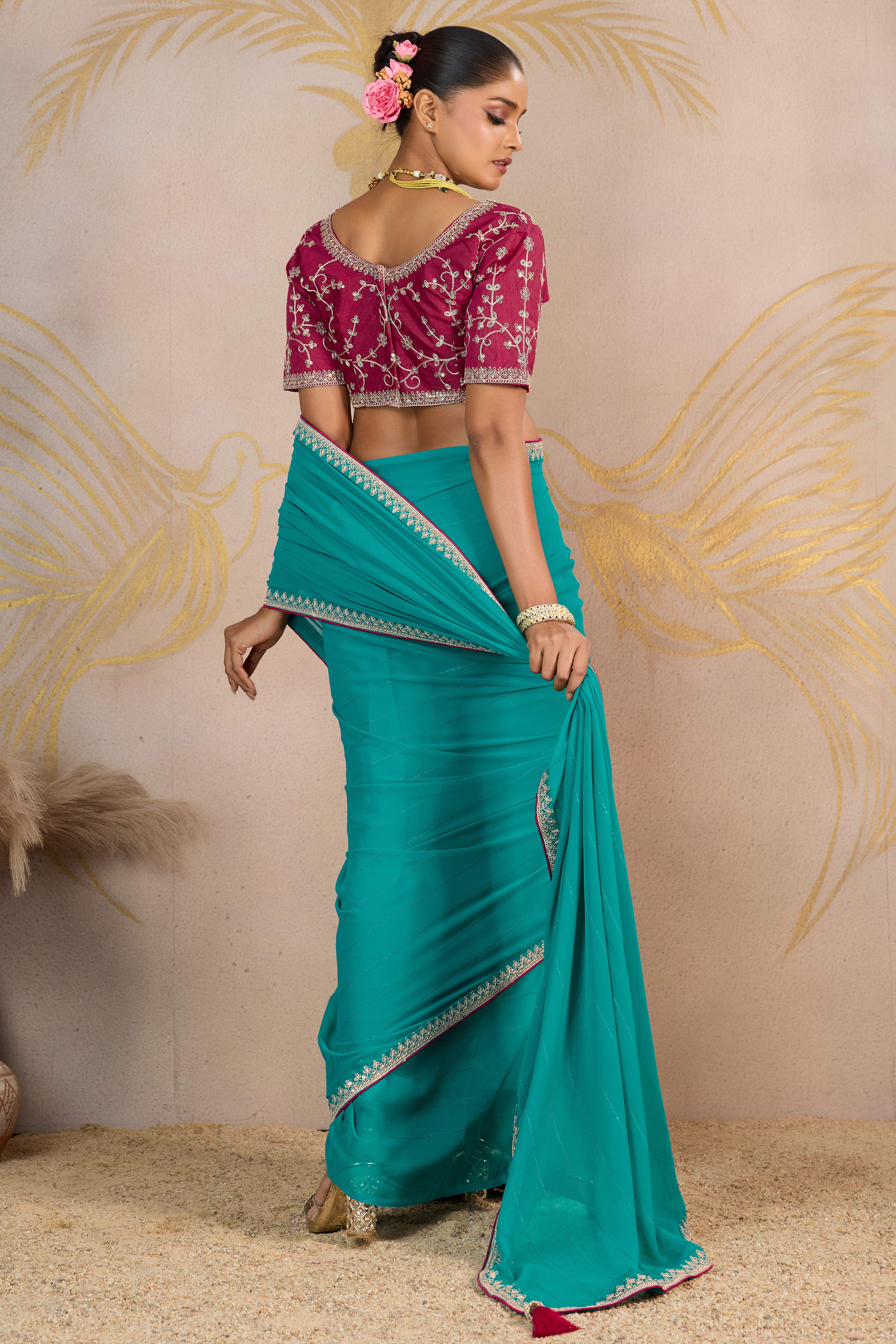 Sky Blue Zari Embroidered Georgette Saree Accented With Sequins