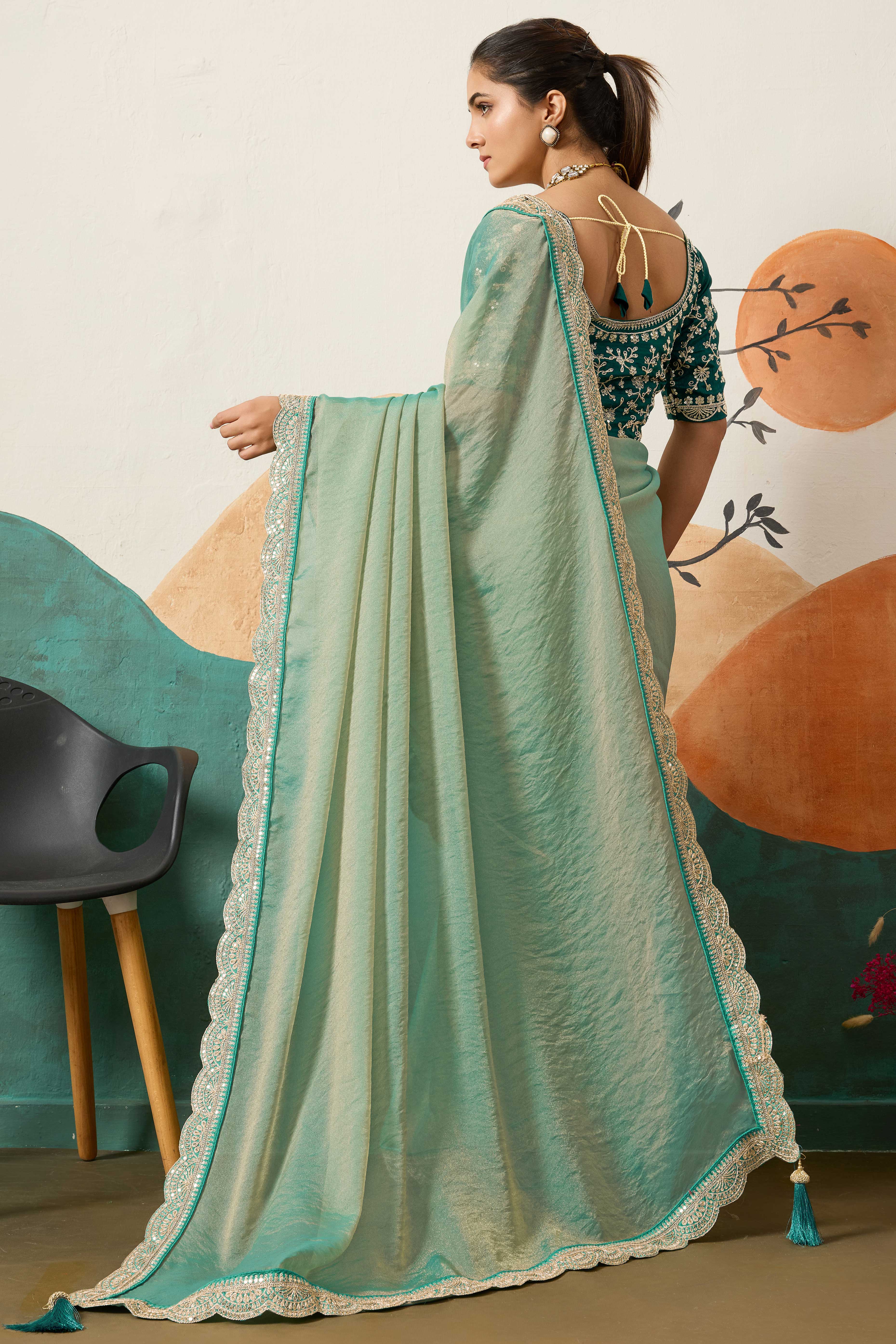 Sophisticated Sea Green Solid Moss Orgnaza Saree With Intricate Cording Sequins Embroidery Border