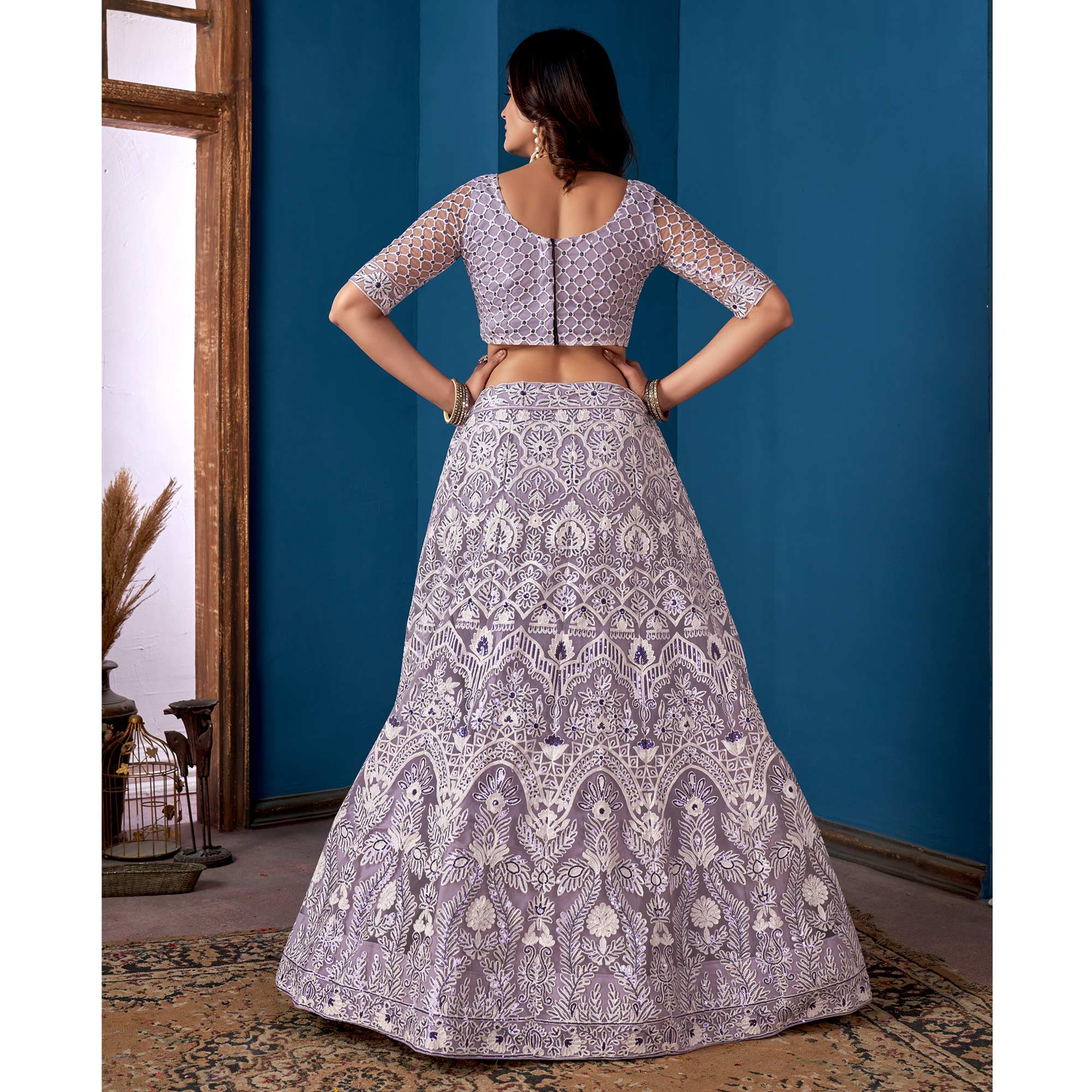 Purple Floral Sequins Embroidered Net Lehenga Choli