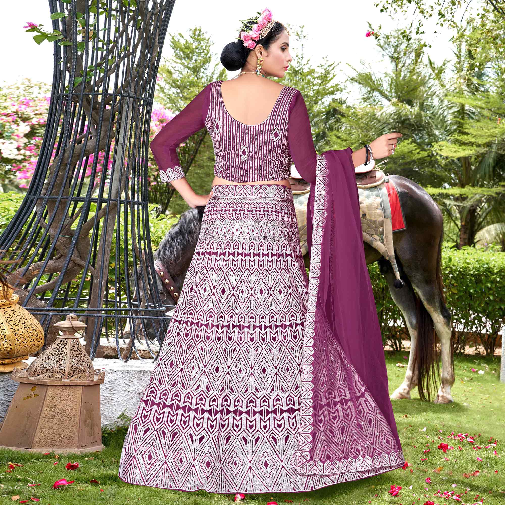 Wine Sequins Embroidered Net Semi Stitched Lehenga Choli