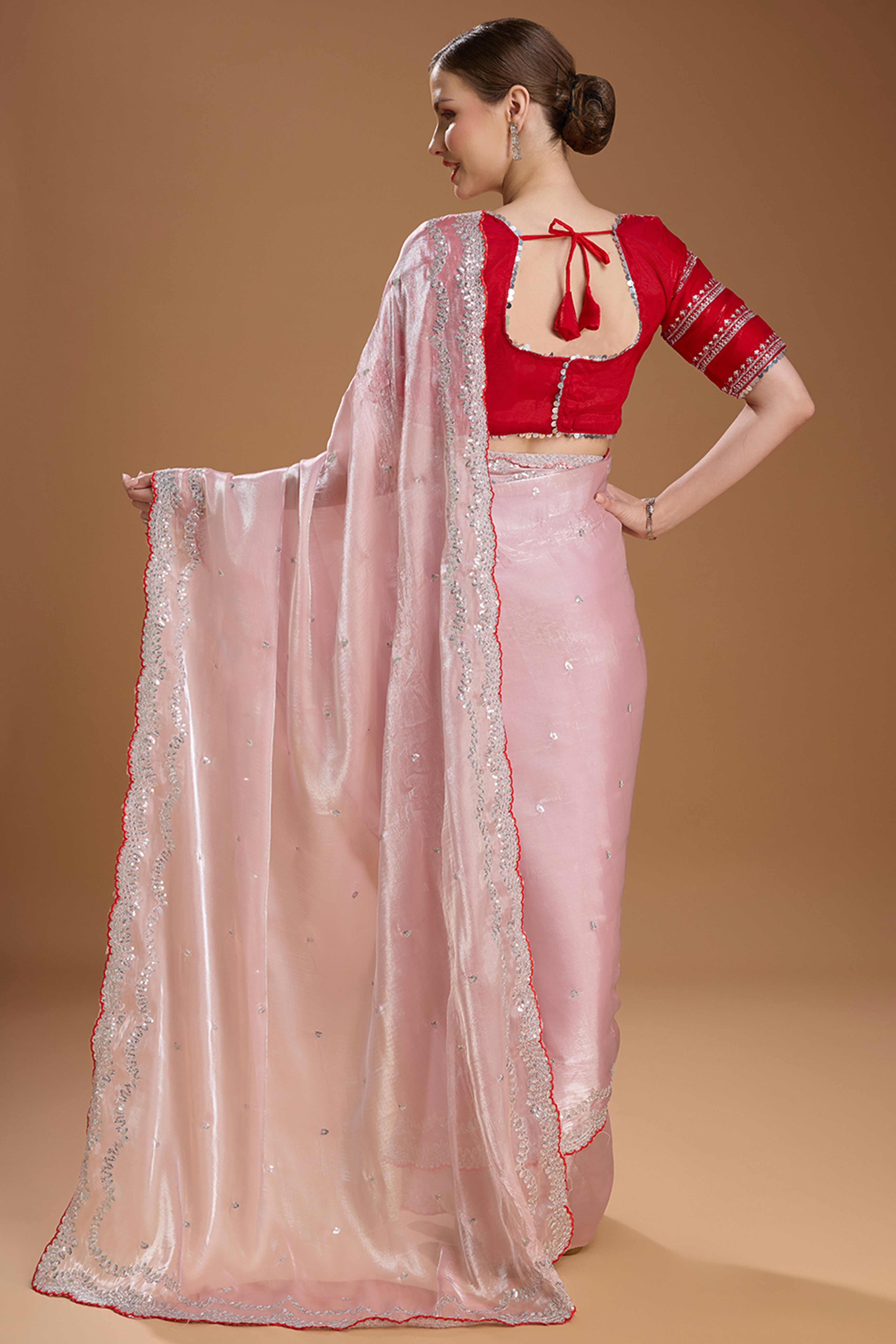 Light Peach Embroidered Saree in Organza with Sequins Accents