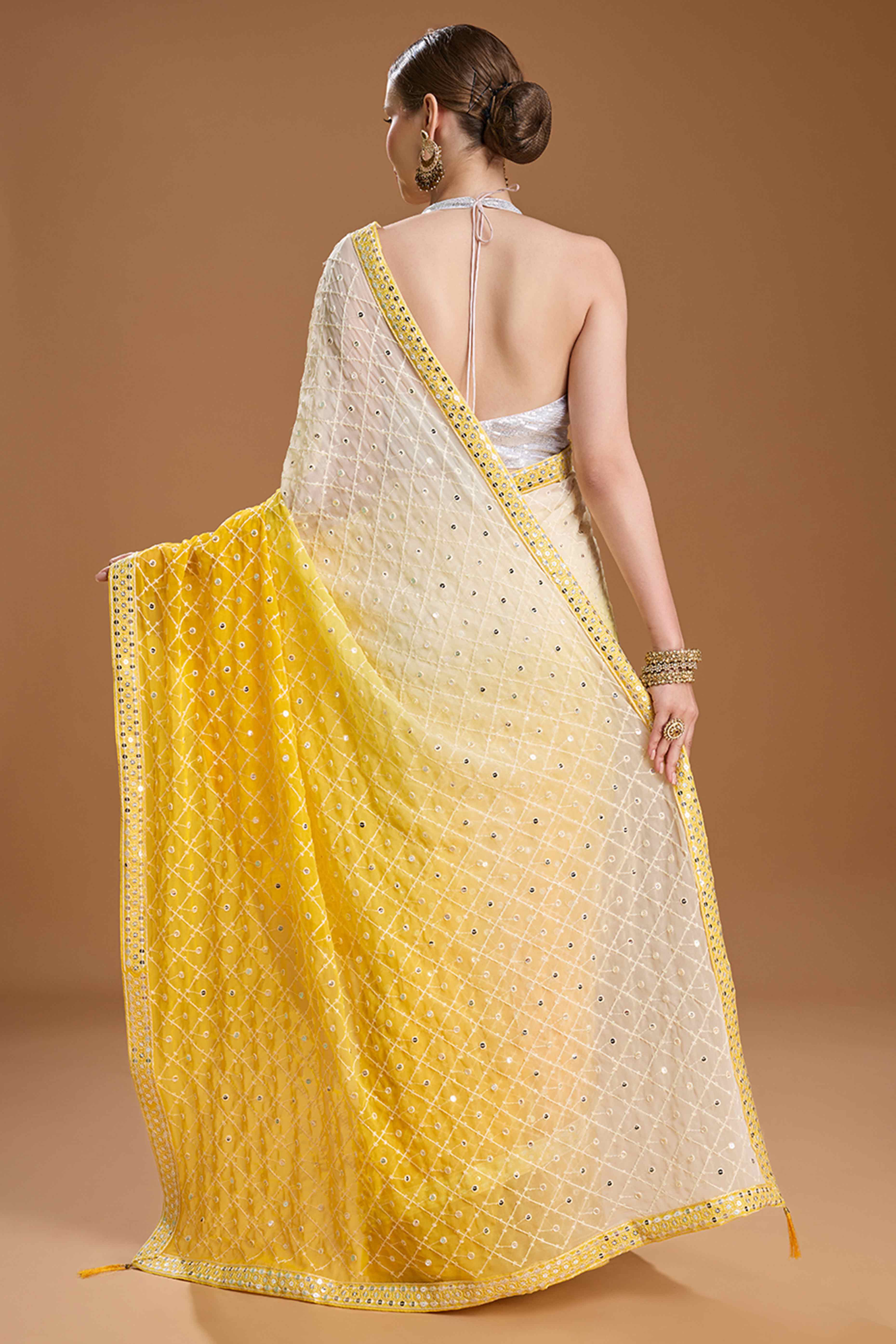 Yellow Georgette Saree Enhanced with Elegant Sequins Embellishments