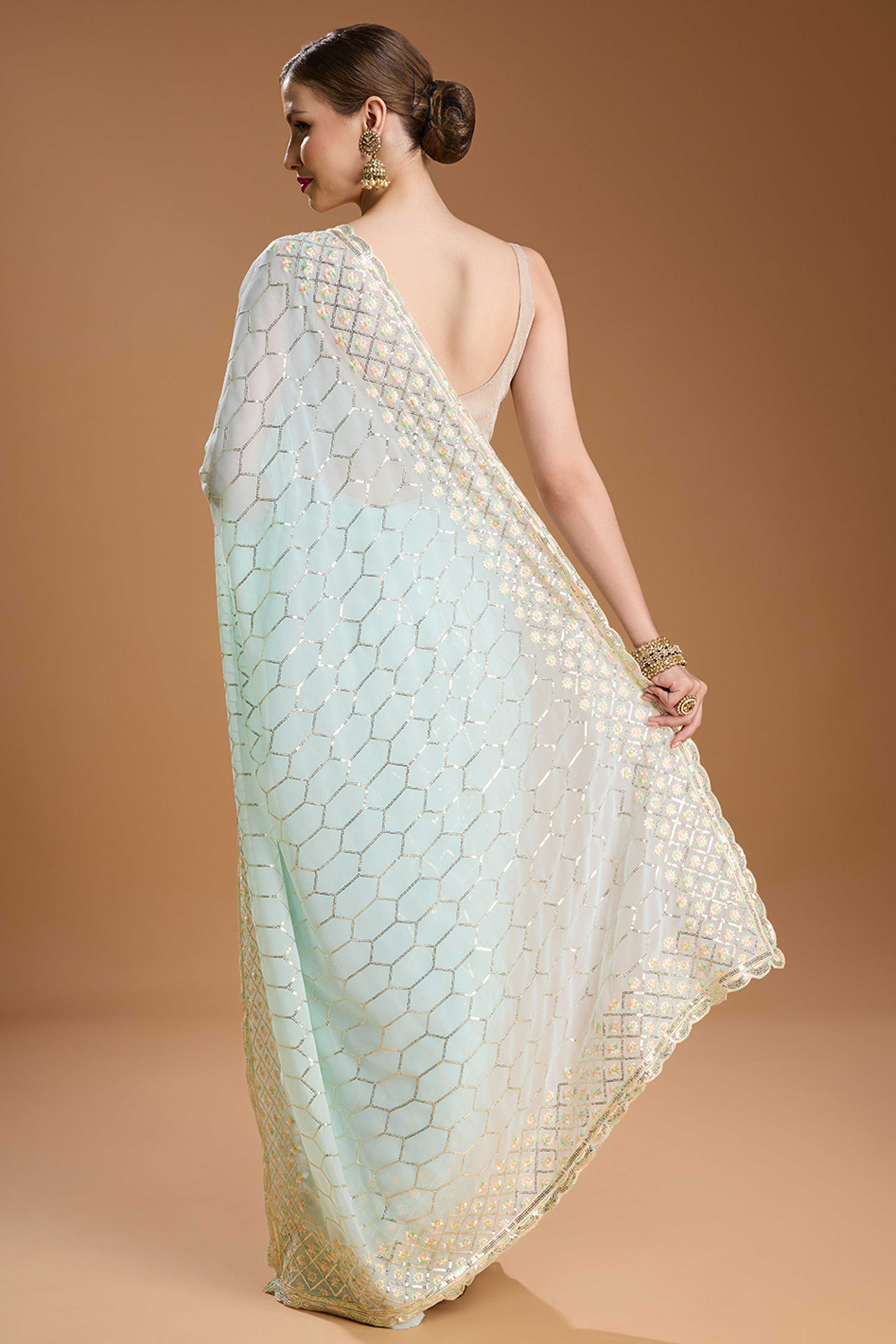 Mint Green Georgette Saree Enhanced with Elegant Sequins Embellishments