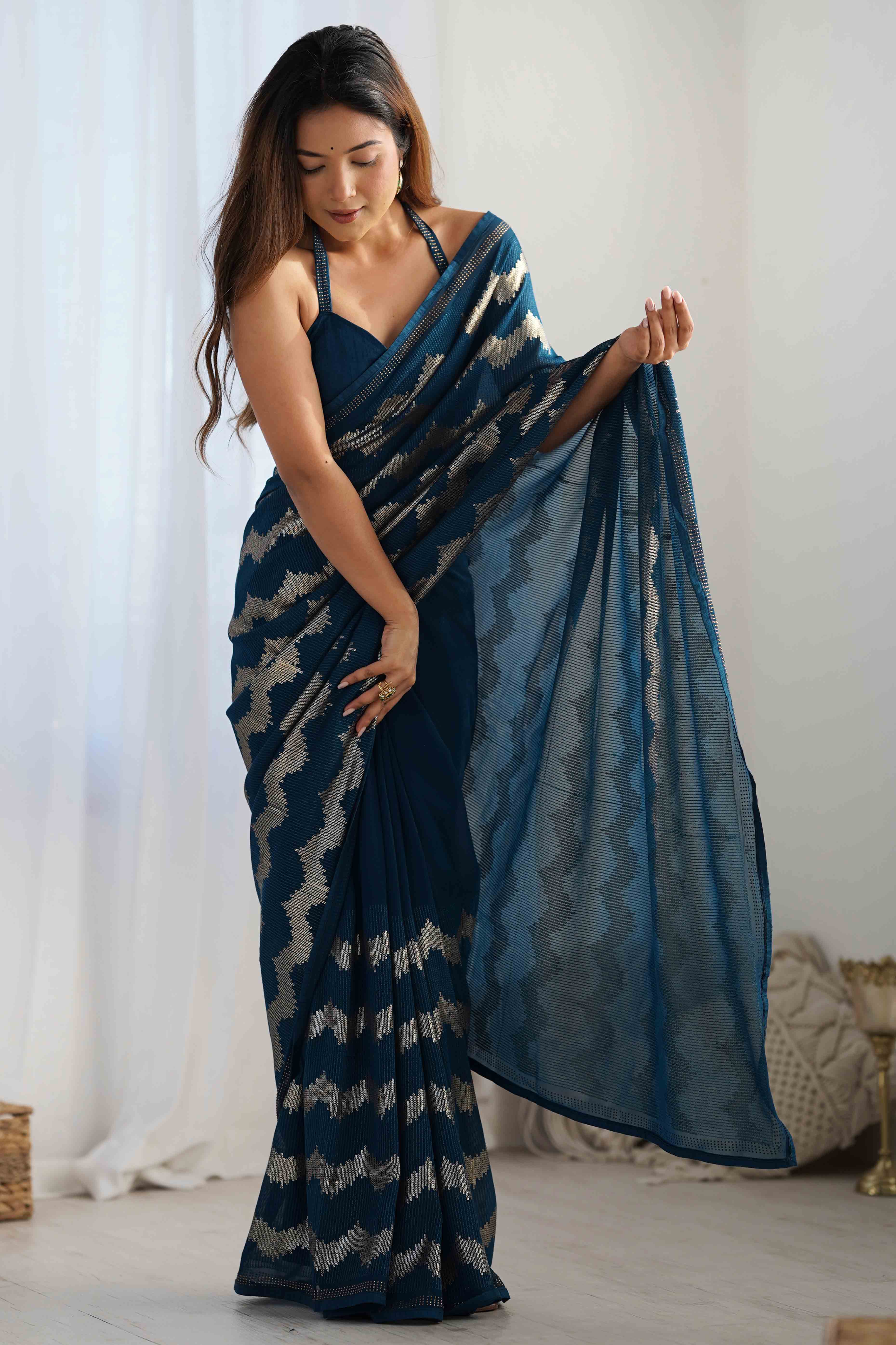 Teal Sequins Embroidered Georgette Saree