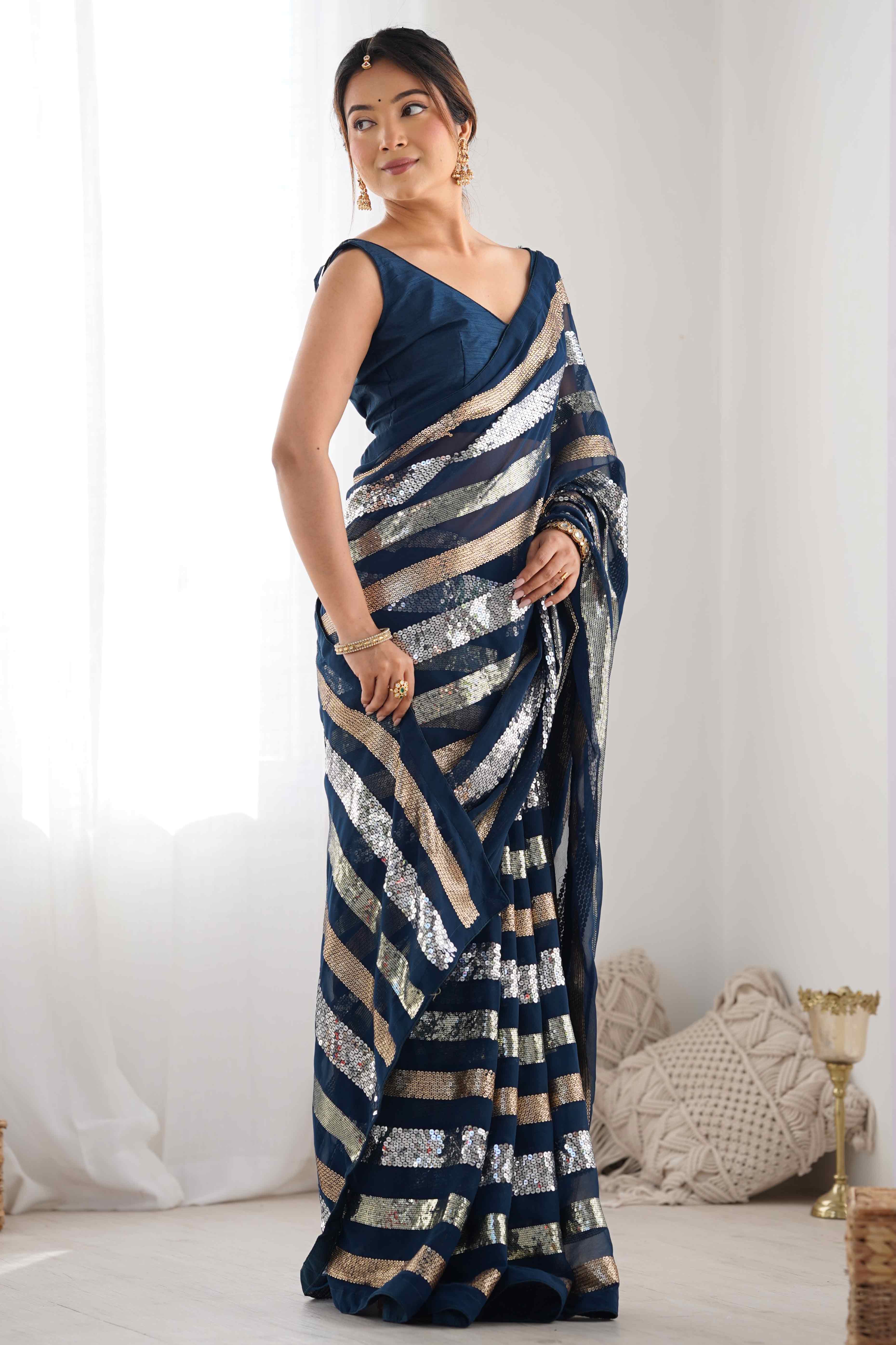 Teal Sequins Embroidered Georgette Saree