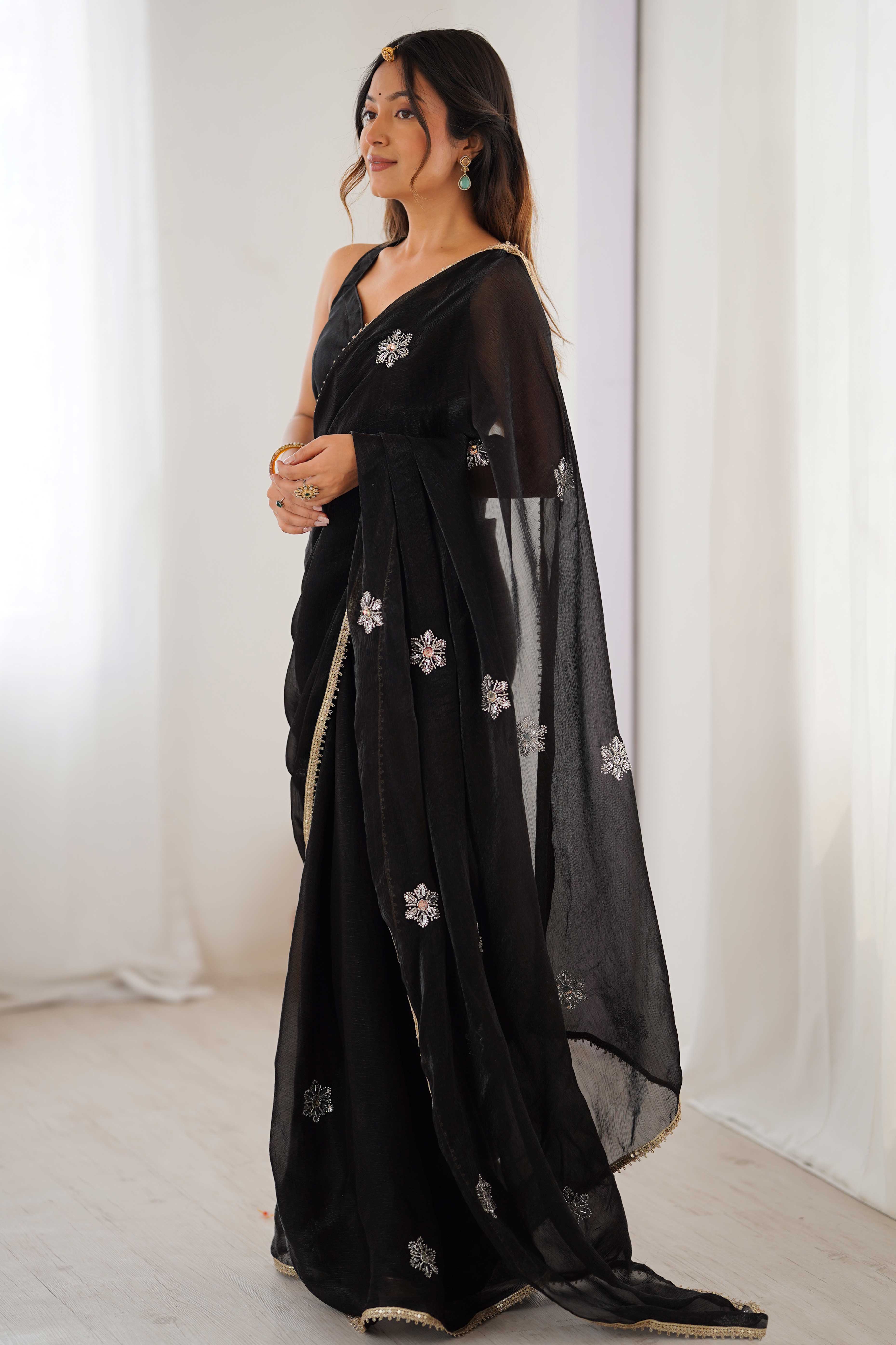 Black Organza Saree Embellished with Intricate Floral Work and Elegant Lace Detailing
