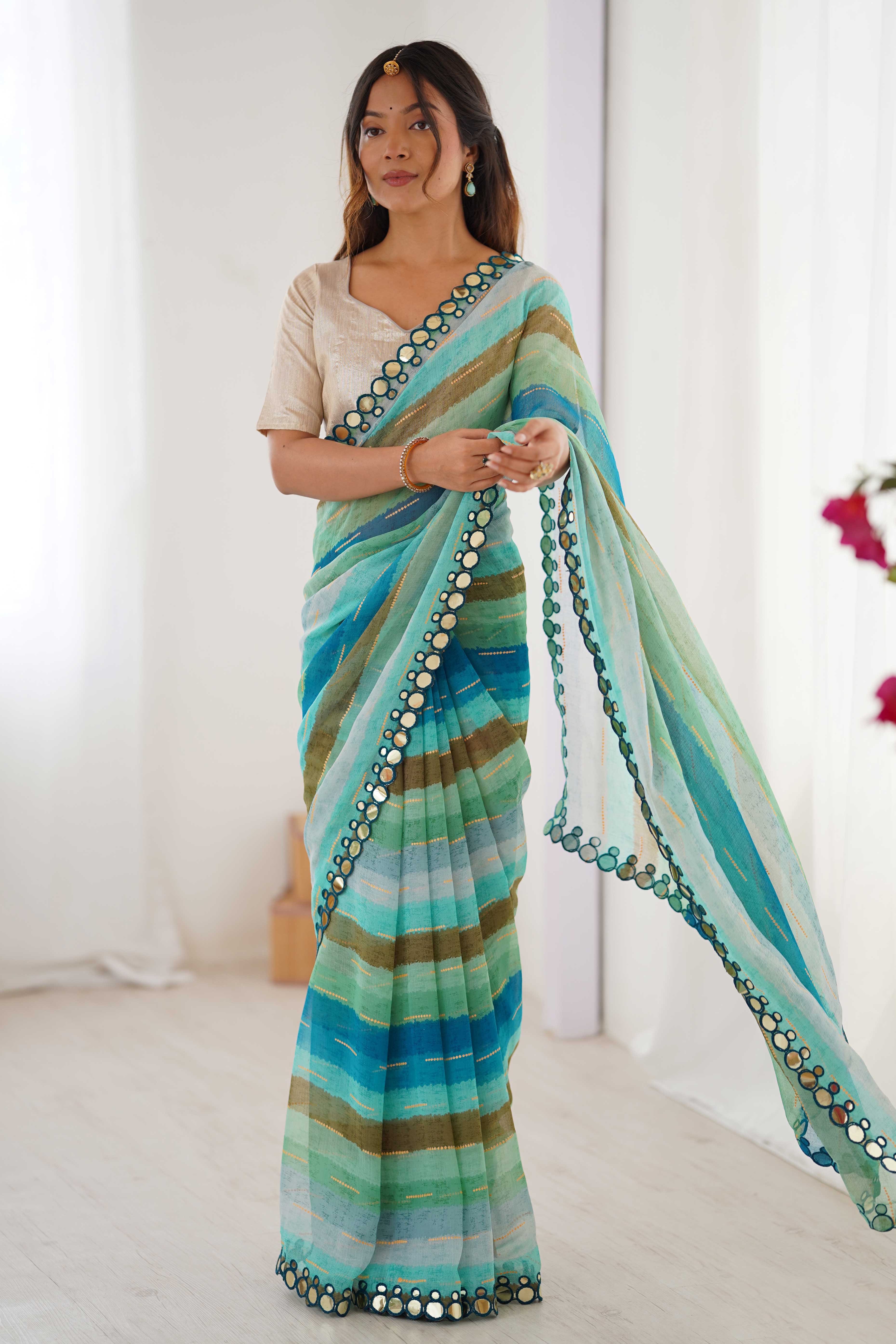 Soft Chiffon Turquoise Saree Featuring Classic Leheriya and Mirror Work Edges
