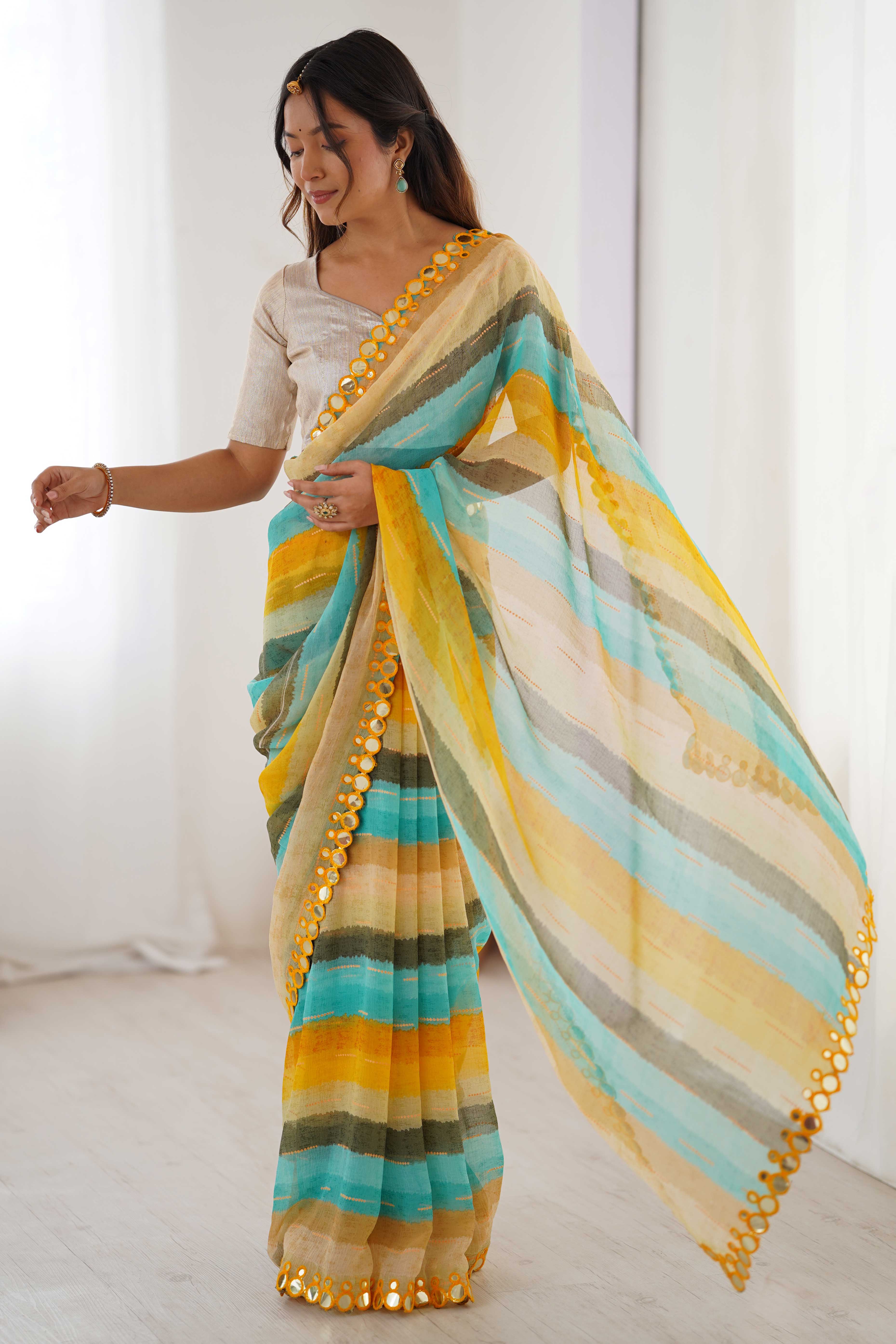 Soft Chiffon Yellow Saree Featuring Classic Leheriya and Mirror Work Edges