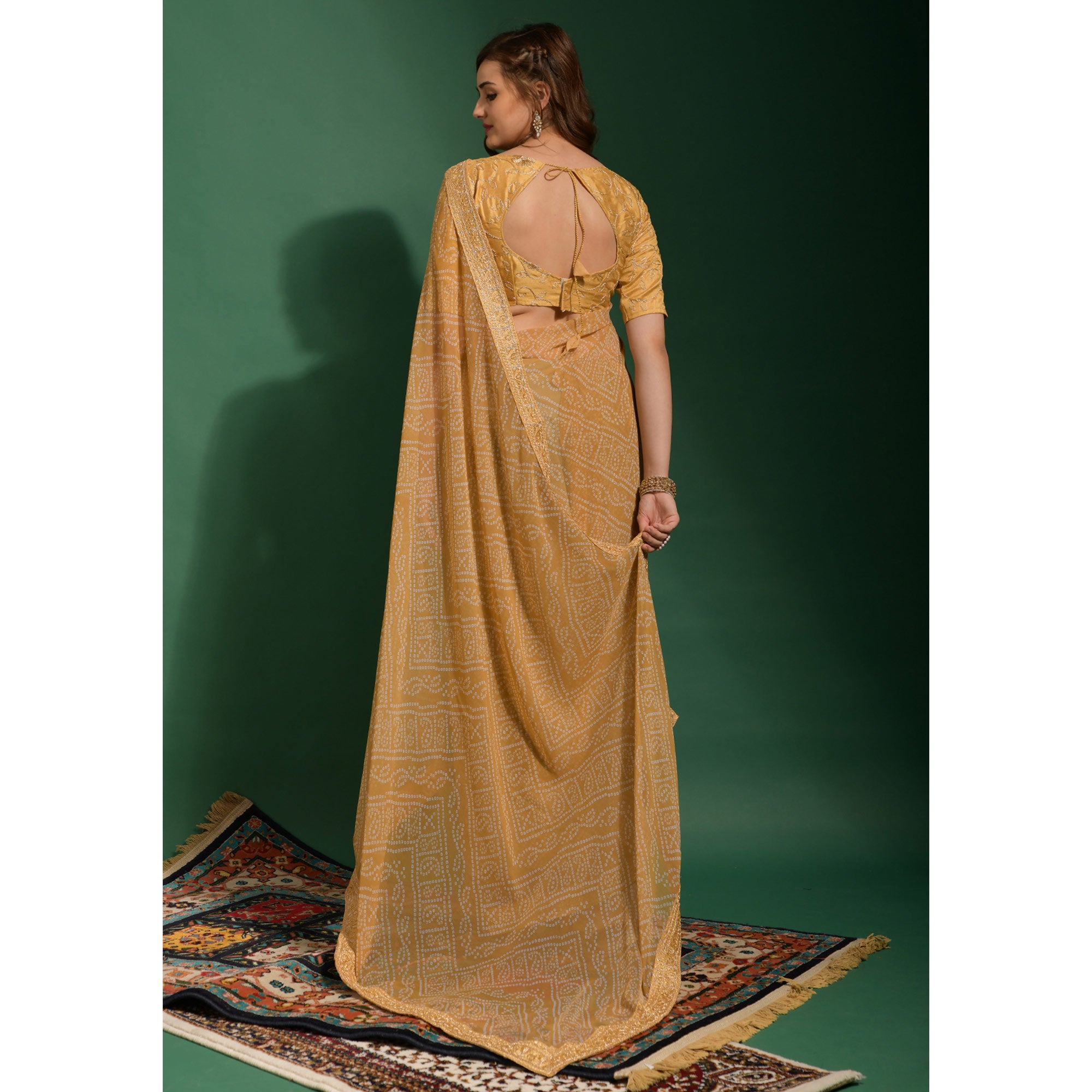 Beige Bandhani Printed Georgette Saree With Embroidered Border