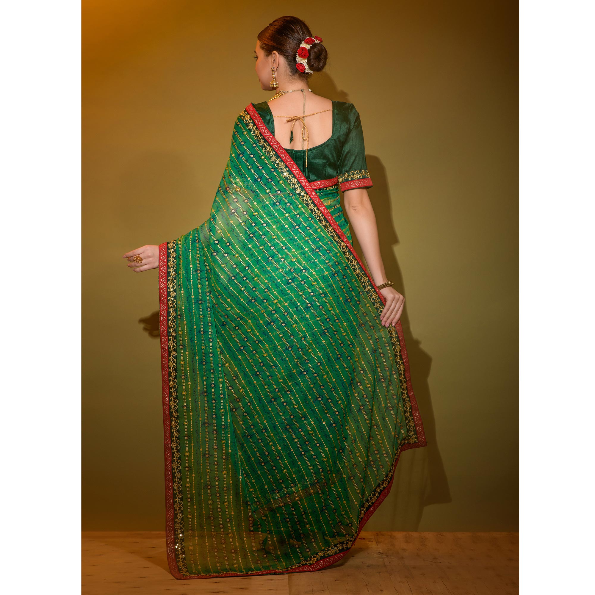 Green Foil Printed Georgette Saree With Embroidered Border