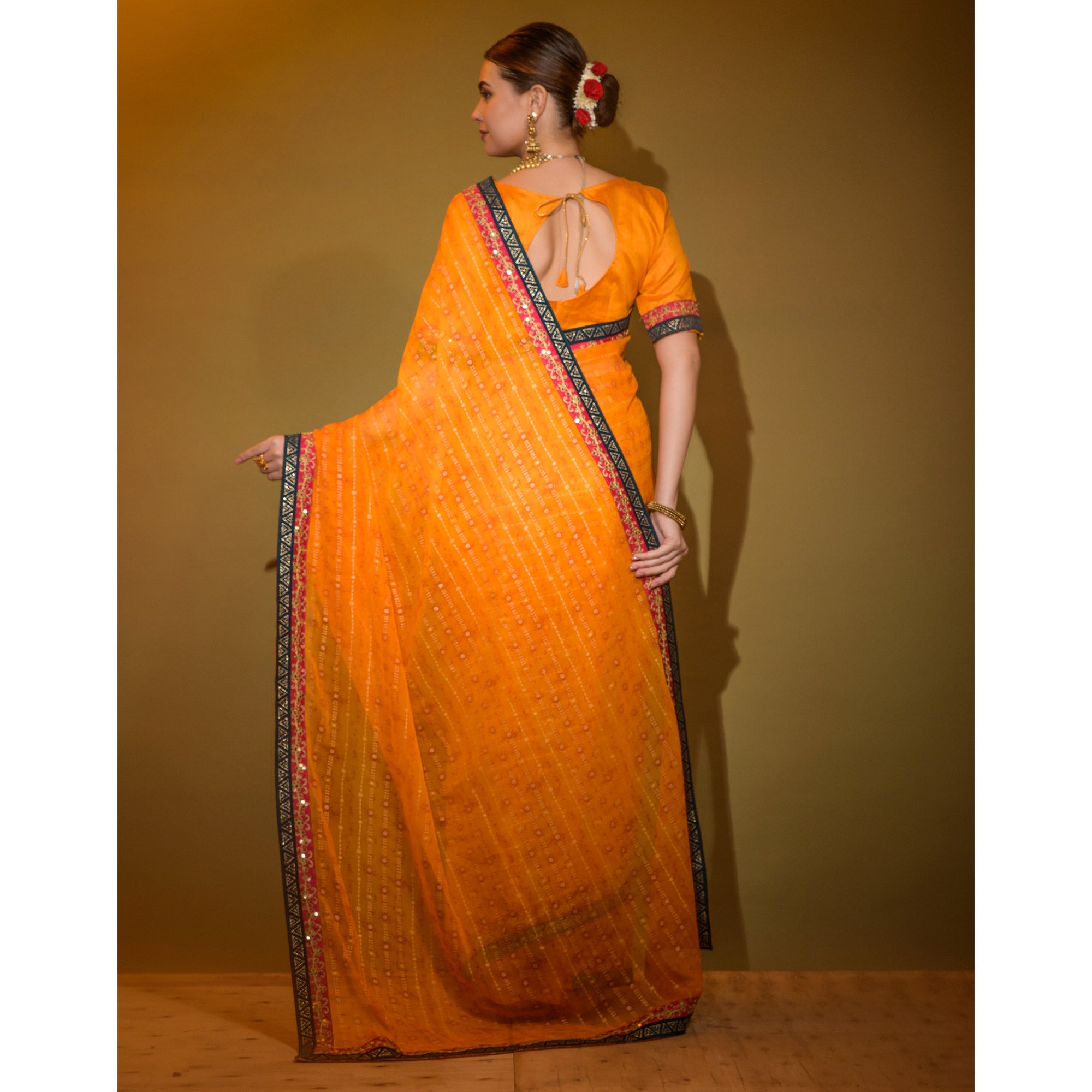 Orange Foil Printed Georgette Saree With Embroidered Border