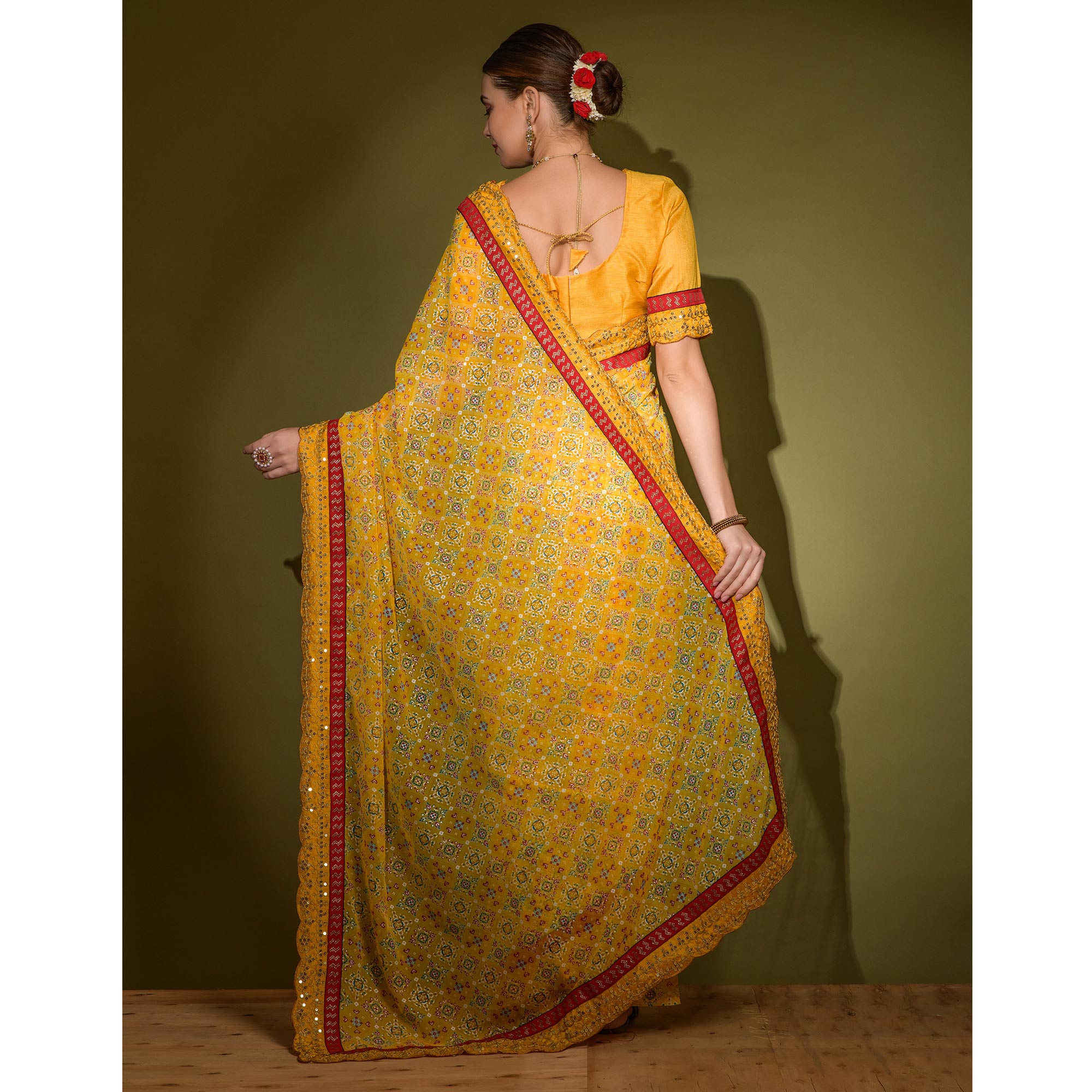 Yellow Patola Foil Printed Georgette Saree with Embroidered Border