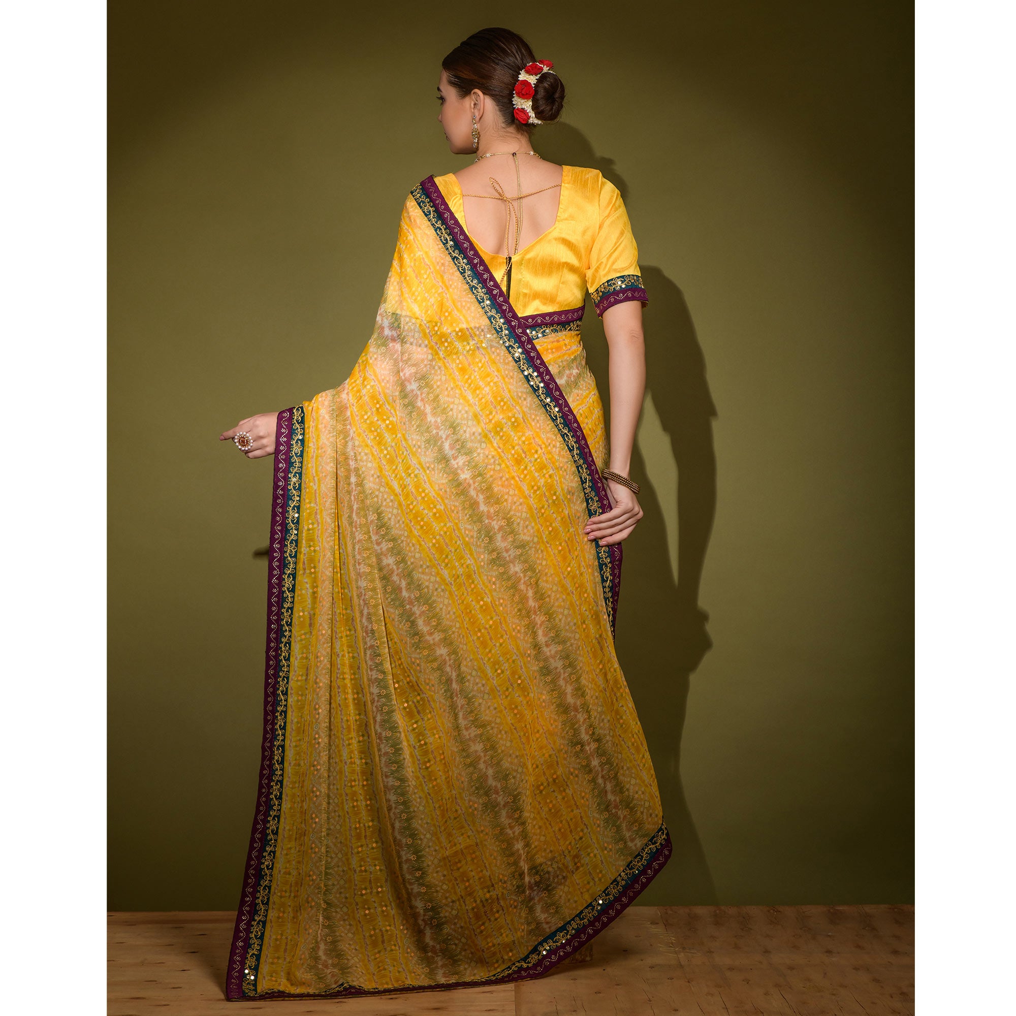 Yellow Leheriya Printed Georgette Saree With Embroidered Border