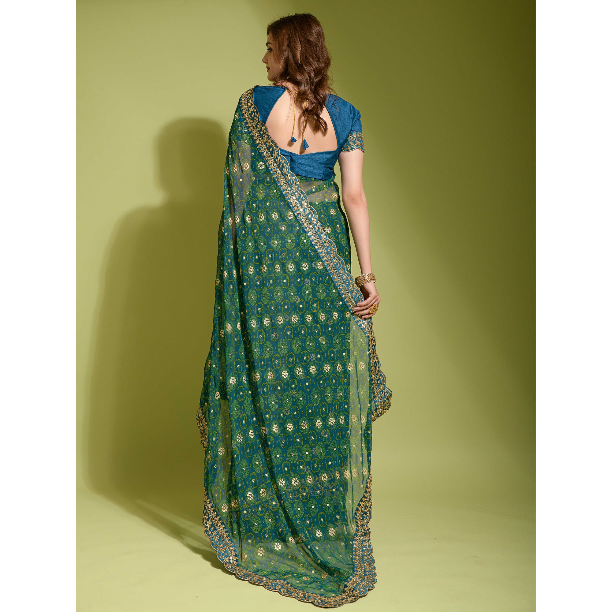 Teal Bandhani Foil Printed Georgette Saree With Embroidered Border