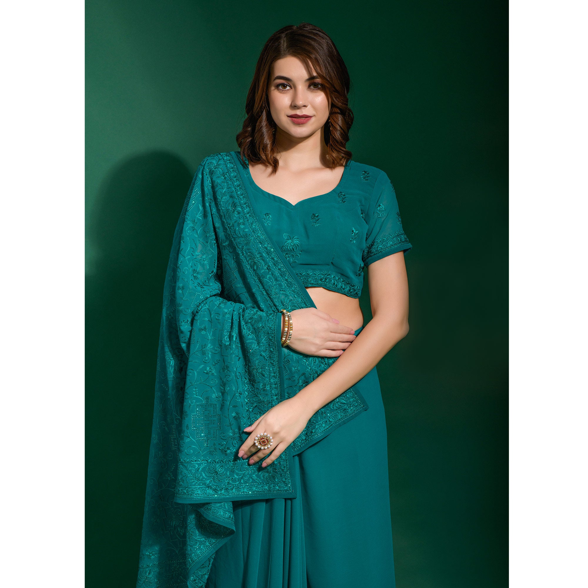 Teal Blue Floral Embroidered Georgette Saree
