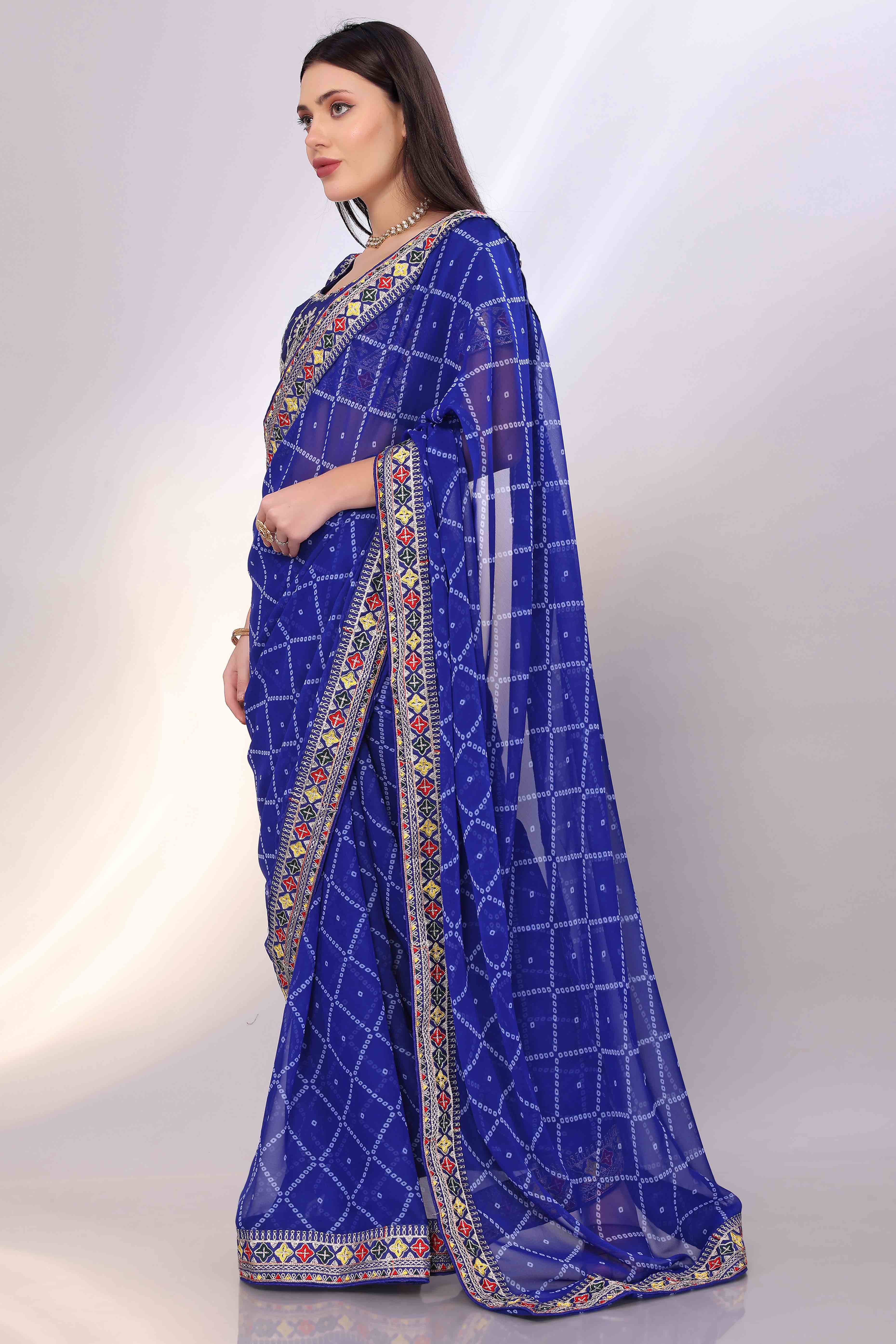 Blue Bandhani Printed Georgette Saree Framed With Elegant Embroidered Border
