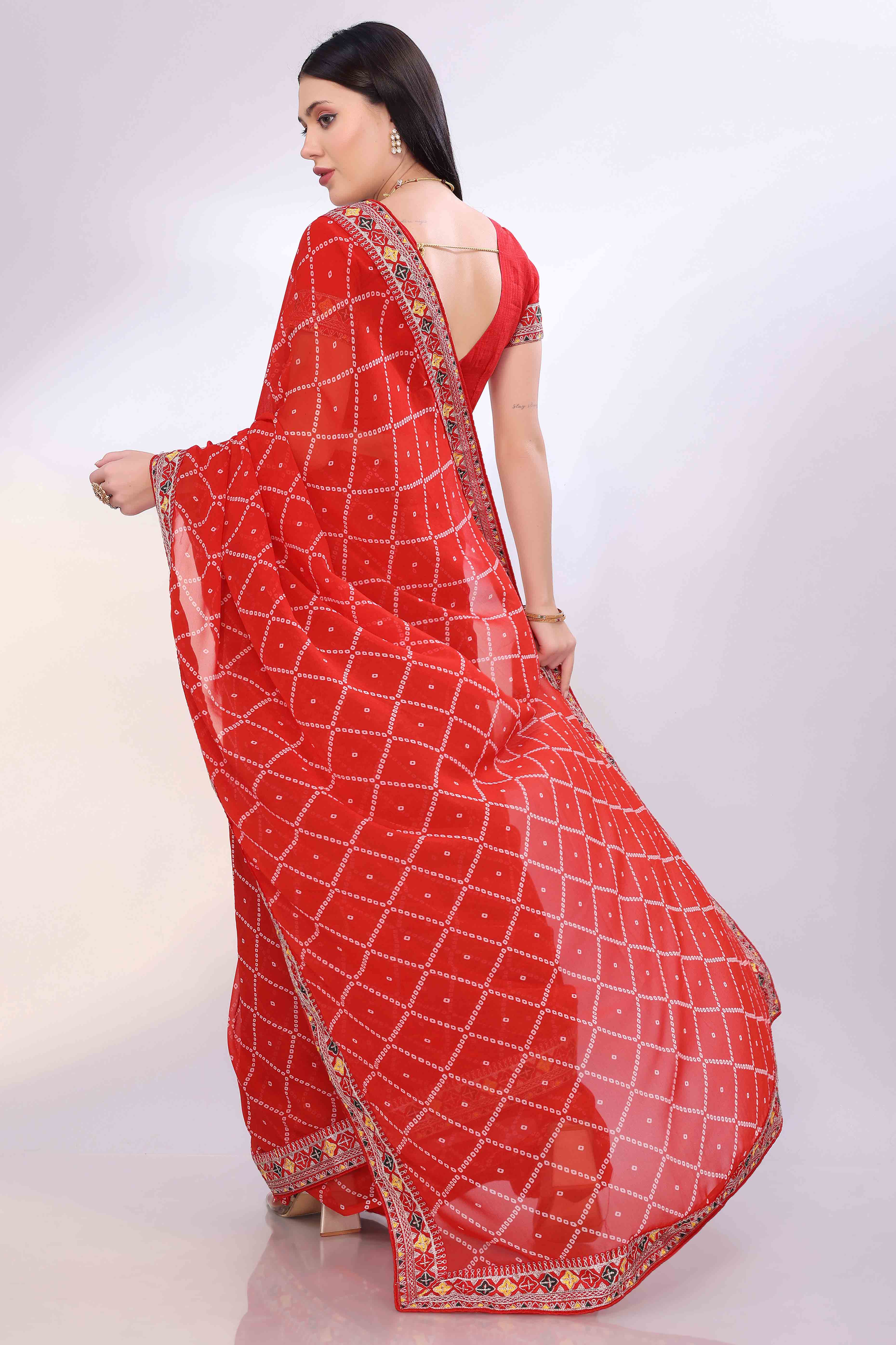 Red Bandhani Printed Georgette Saree Framed With Elegant Embroidered Border