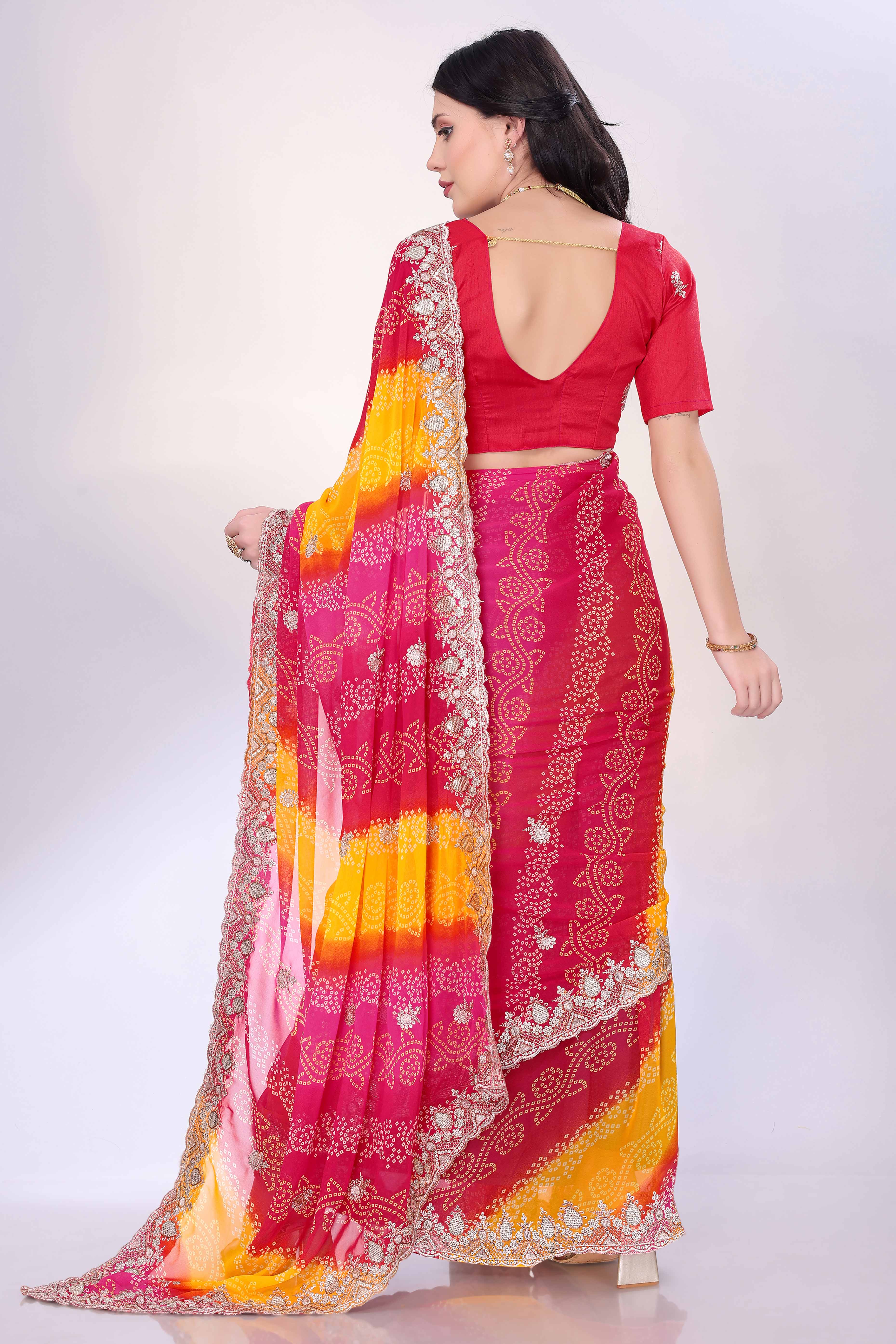 Pink Georgette Saree Showcasing Bandhani Print & Delicate Floral Sequins Embroidery