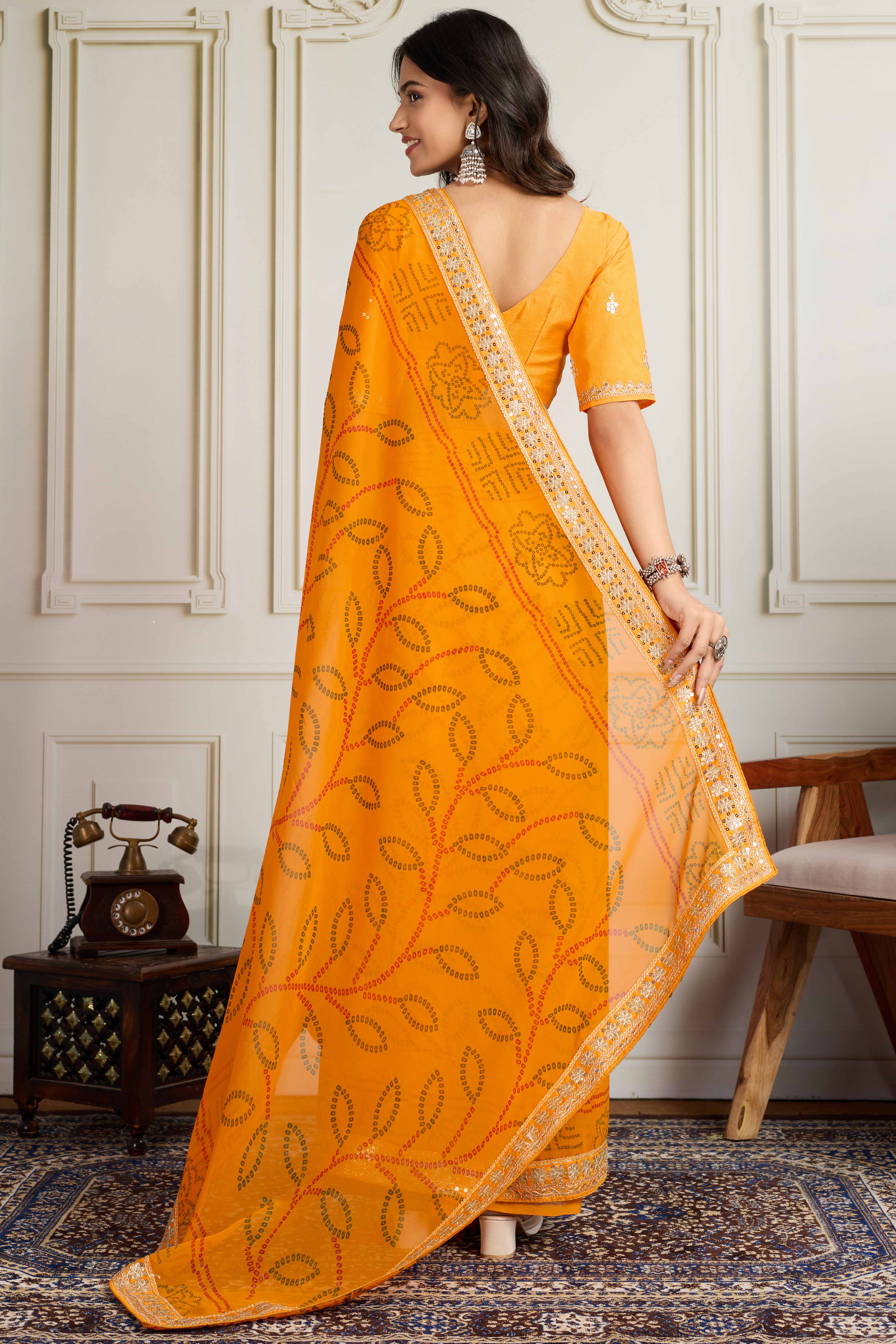 Mustard Bandhani Digital Printed Georgette Saree Enhanced With Cording Embroidered Border