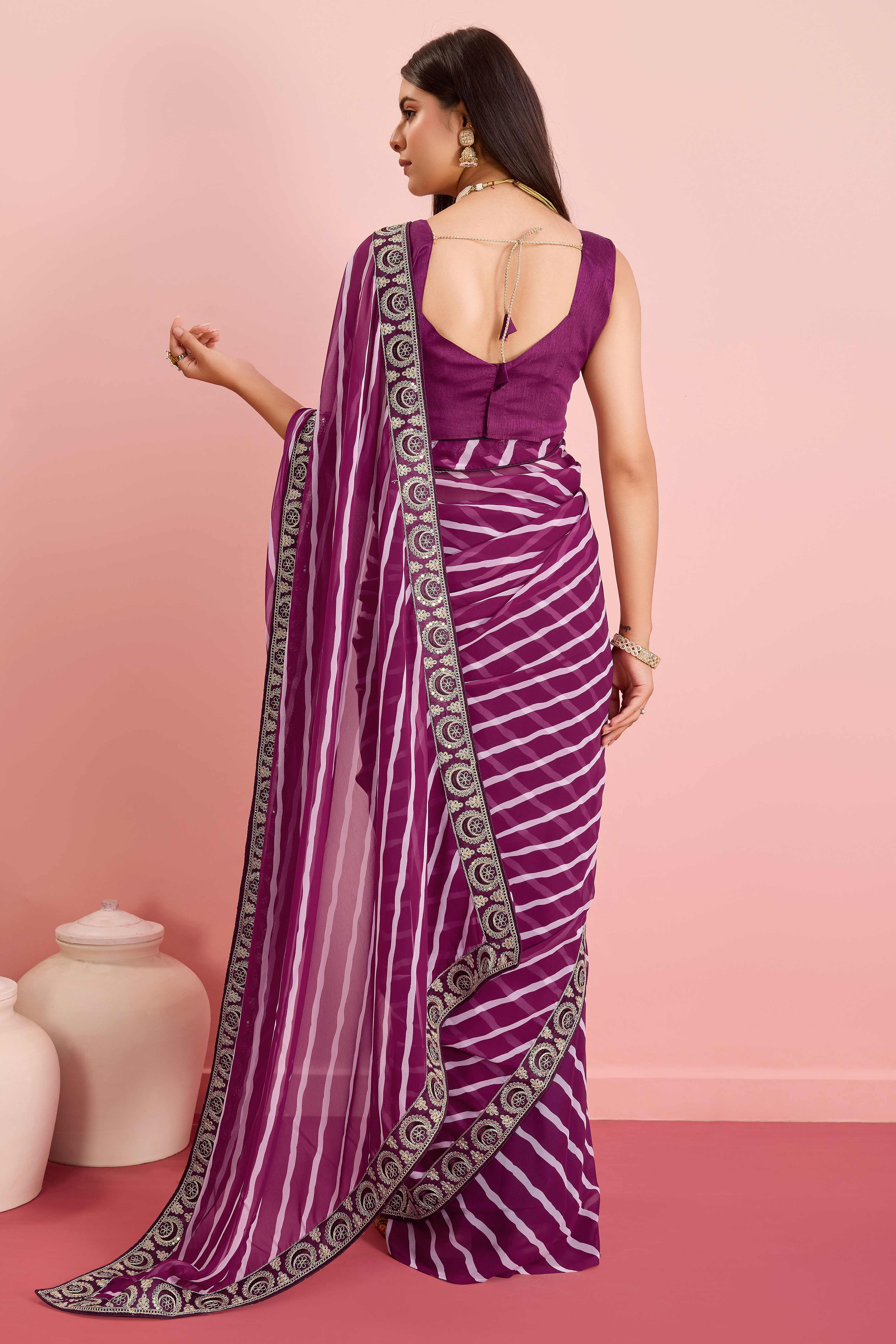 Elegant Purple Leheriya Printed Saree in Flowing Georgette