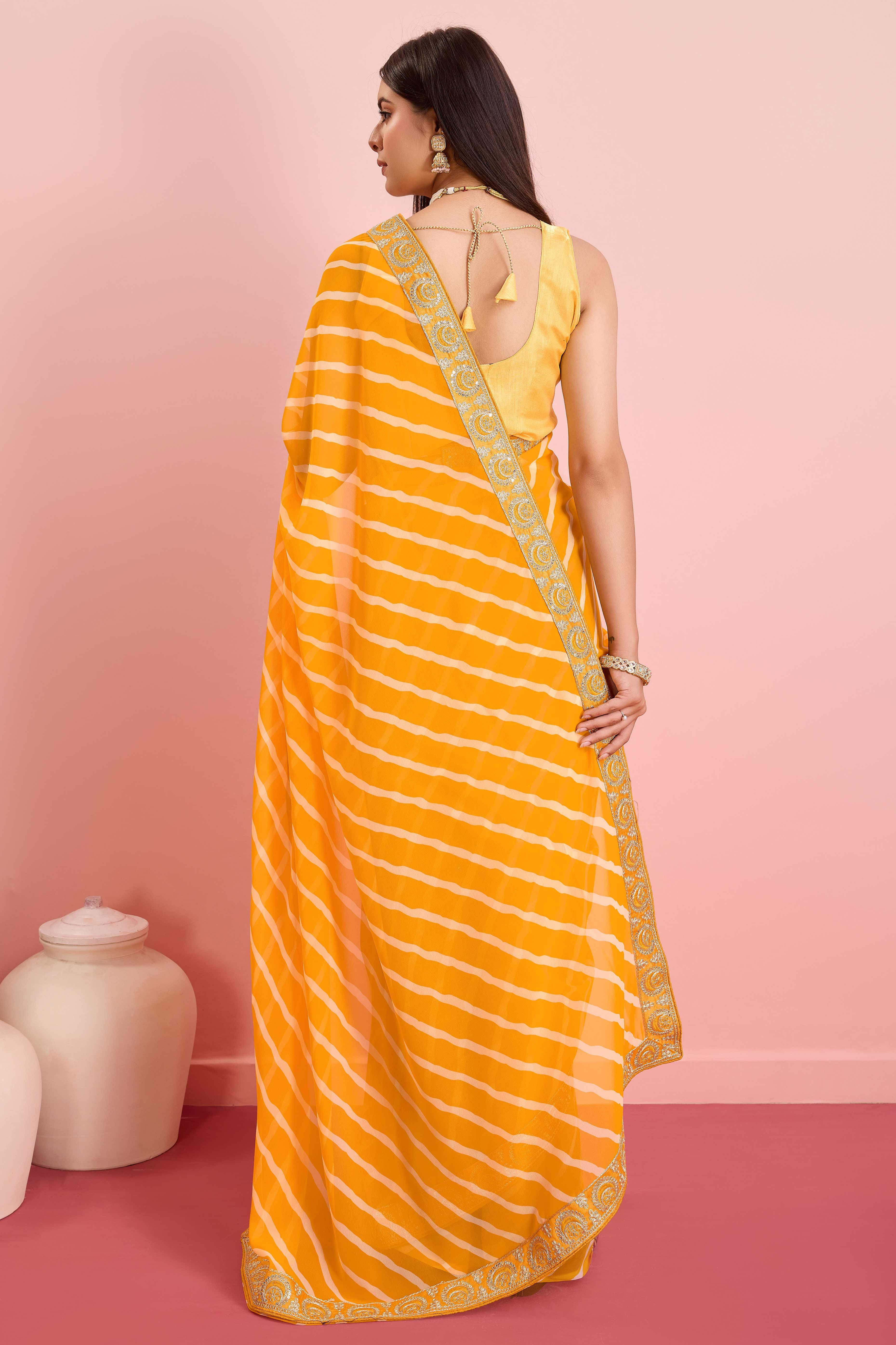 Elegant Yellow Leheriya Printed Saree in Flowing Georgette