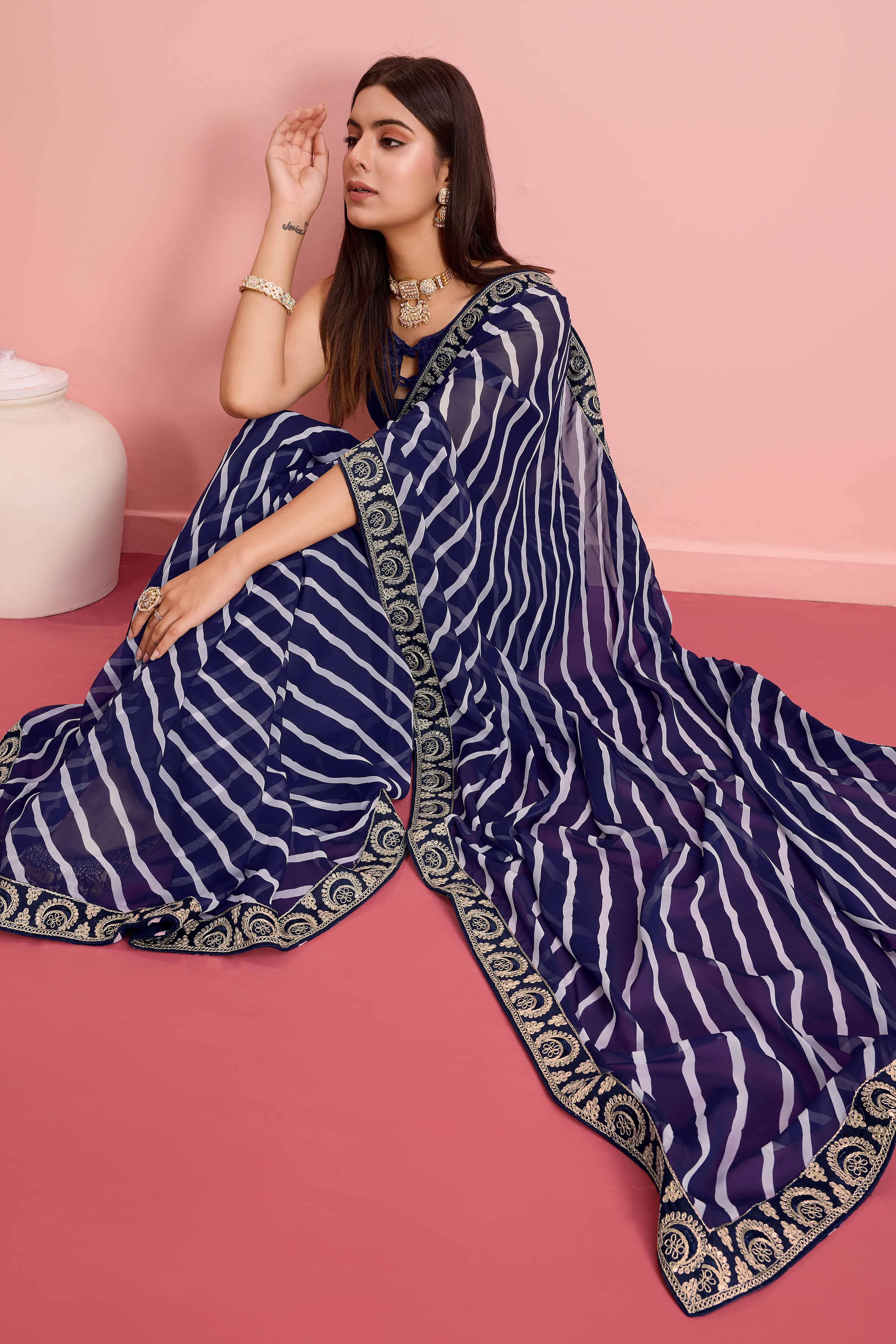 Elegant Blue Leheriya Printed Saree in Flowing Georgette