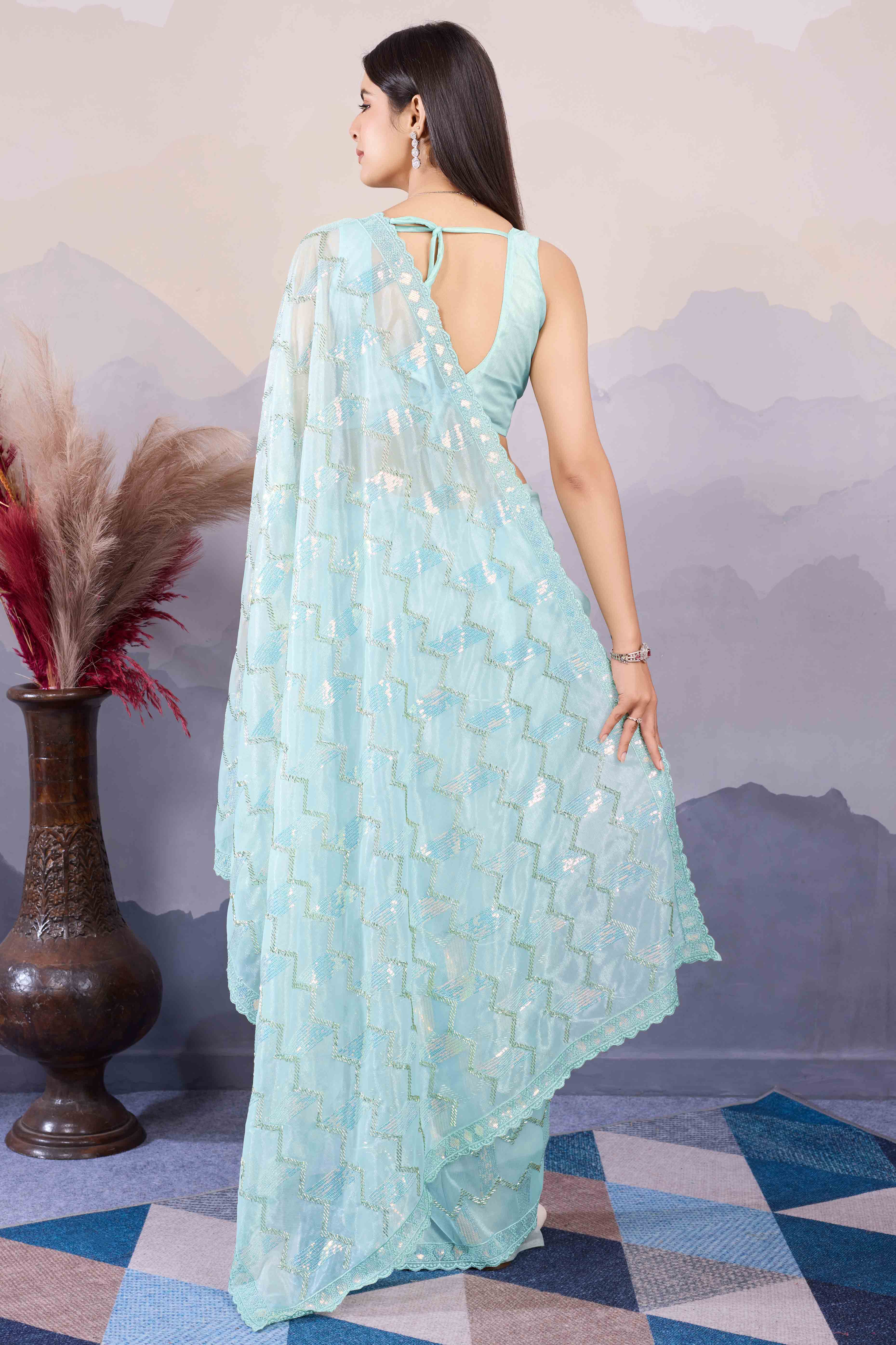 Light Turquoise Sequins Embroidered Twill Net Saree