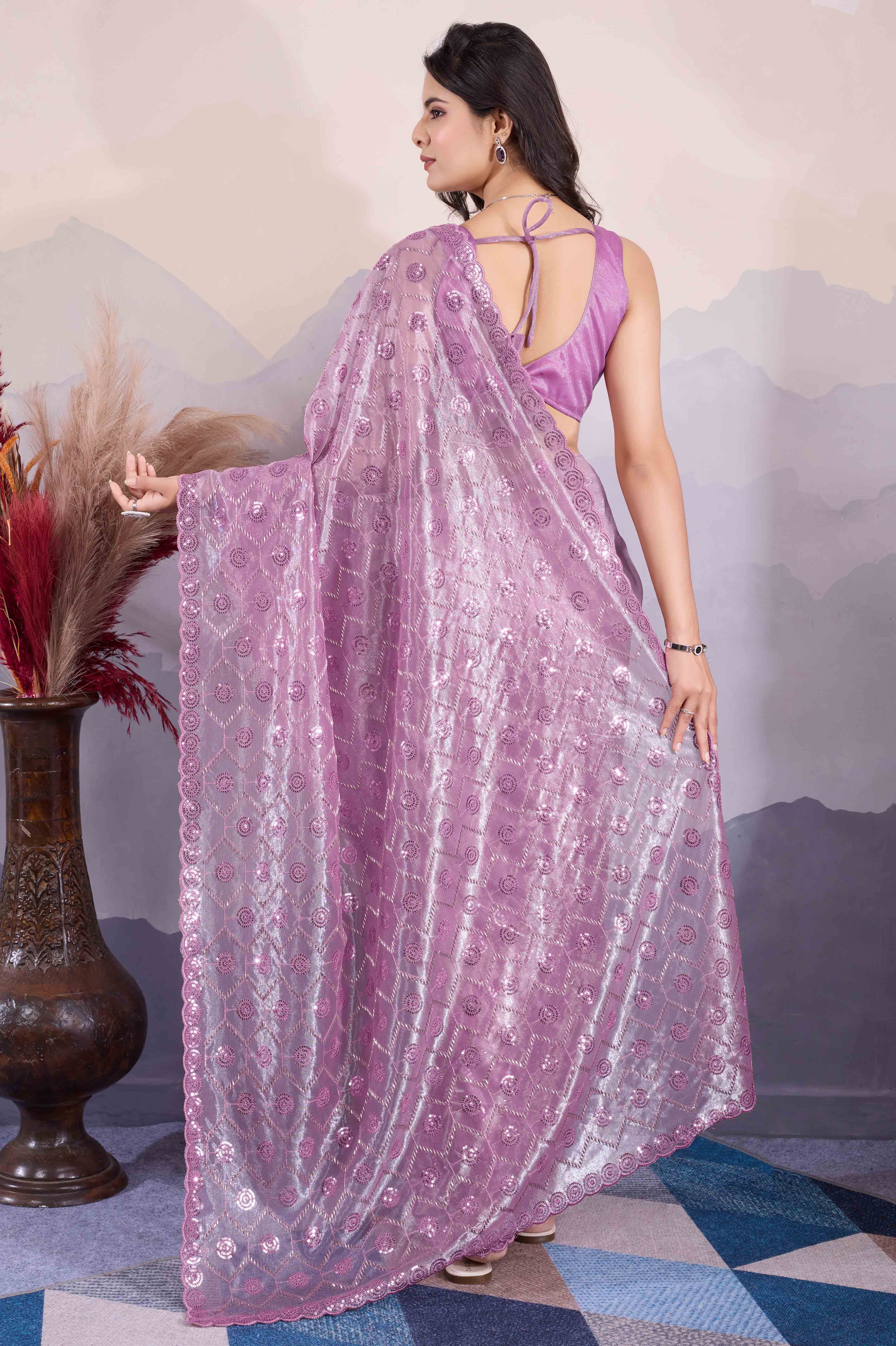 Mauve Sequins Embroidered Twill Net Saree